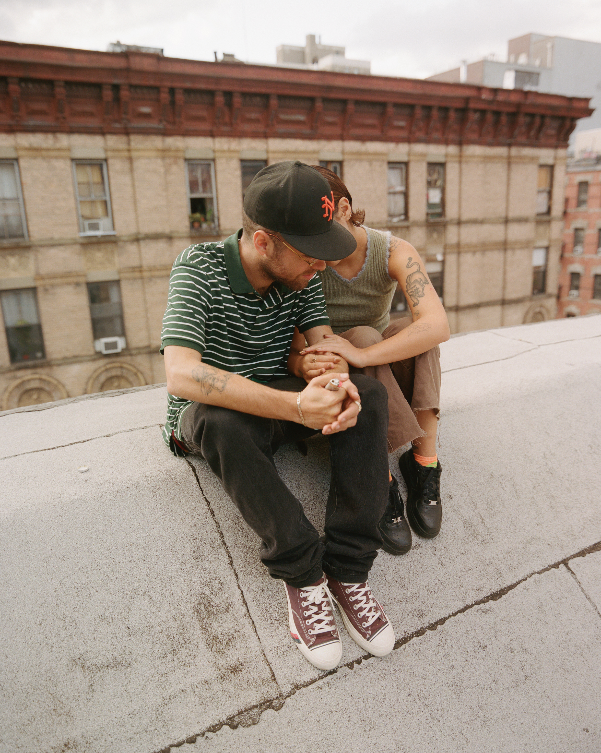 wiki and his girlfriend embracing on a new york rooftop