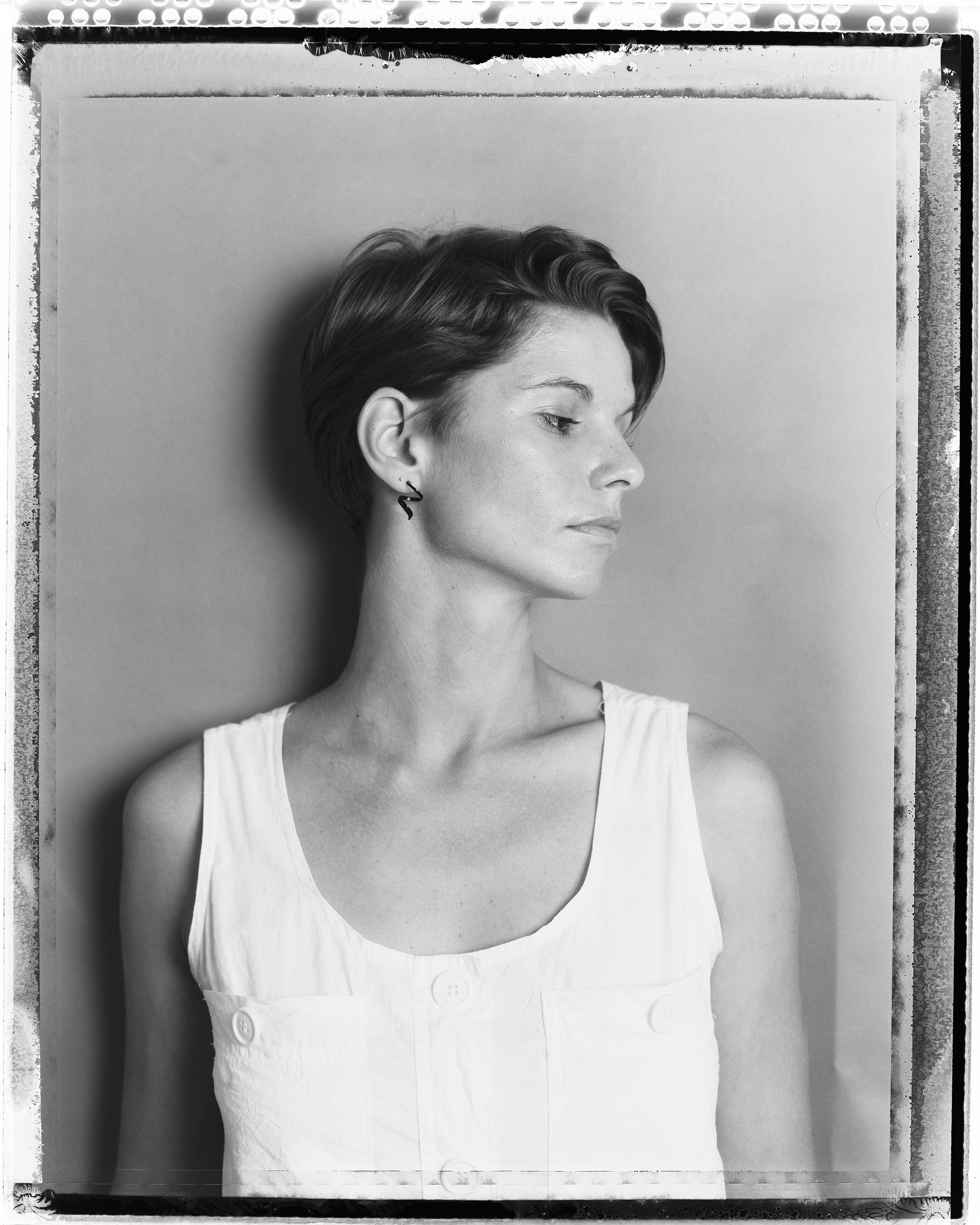 a black and white portrait of Lisa Adams in 1985 by tom warren