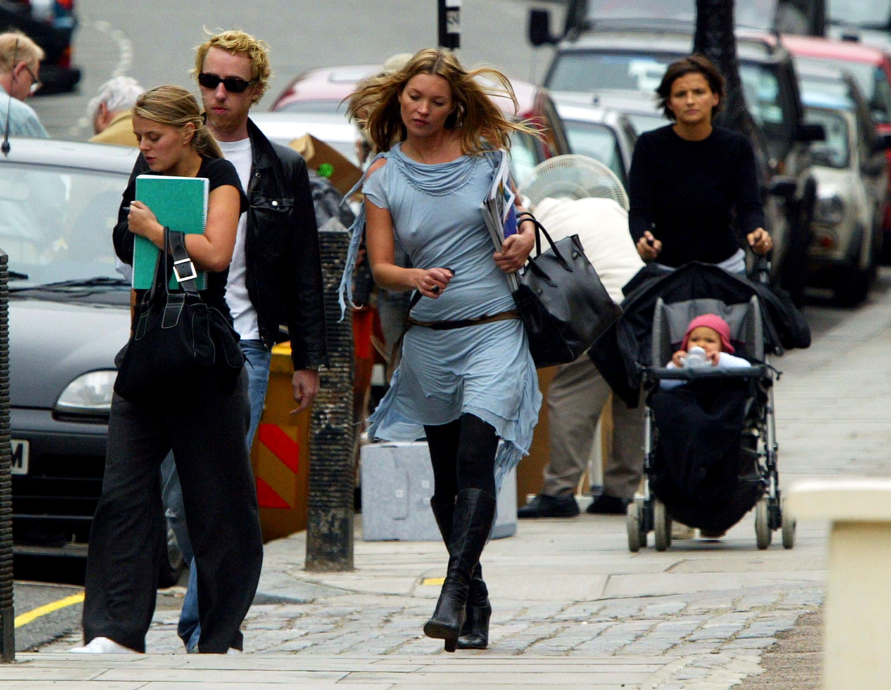 kate moss walking down the street in london wearing a pale blue balenciaga jersey dress 2003