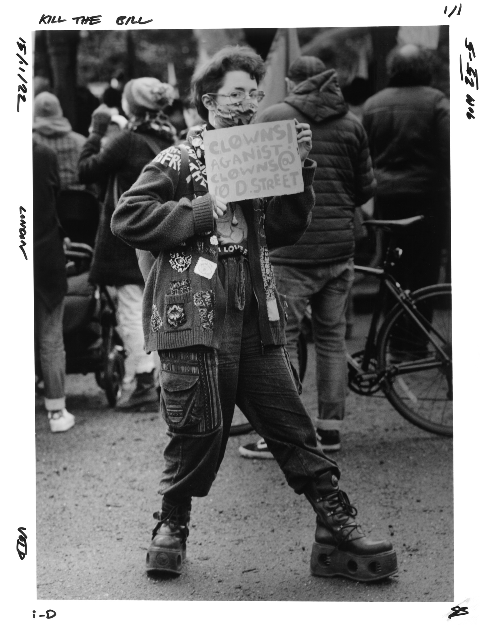 Protester holding a sign saying