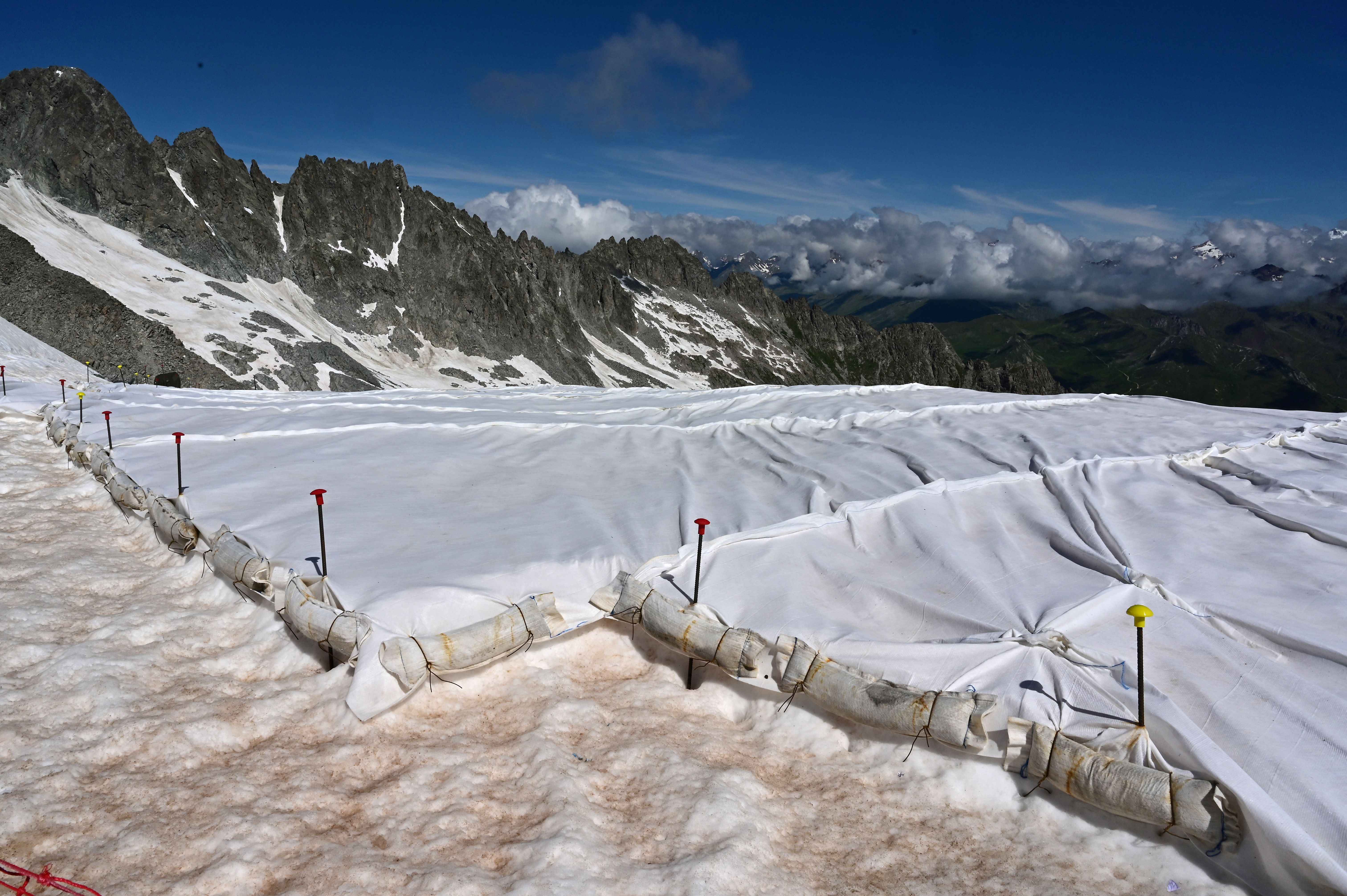 Italy covers the shrinking Presena glacier near Pellizzano to save the skiing slopes from summer heat. Photo: Miguel MEDINA / AFP