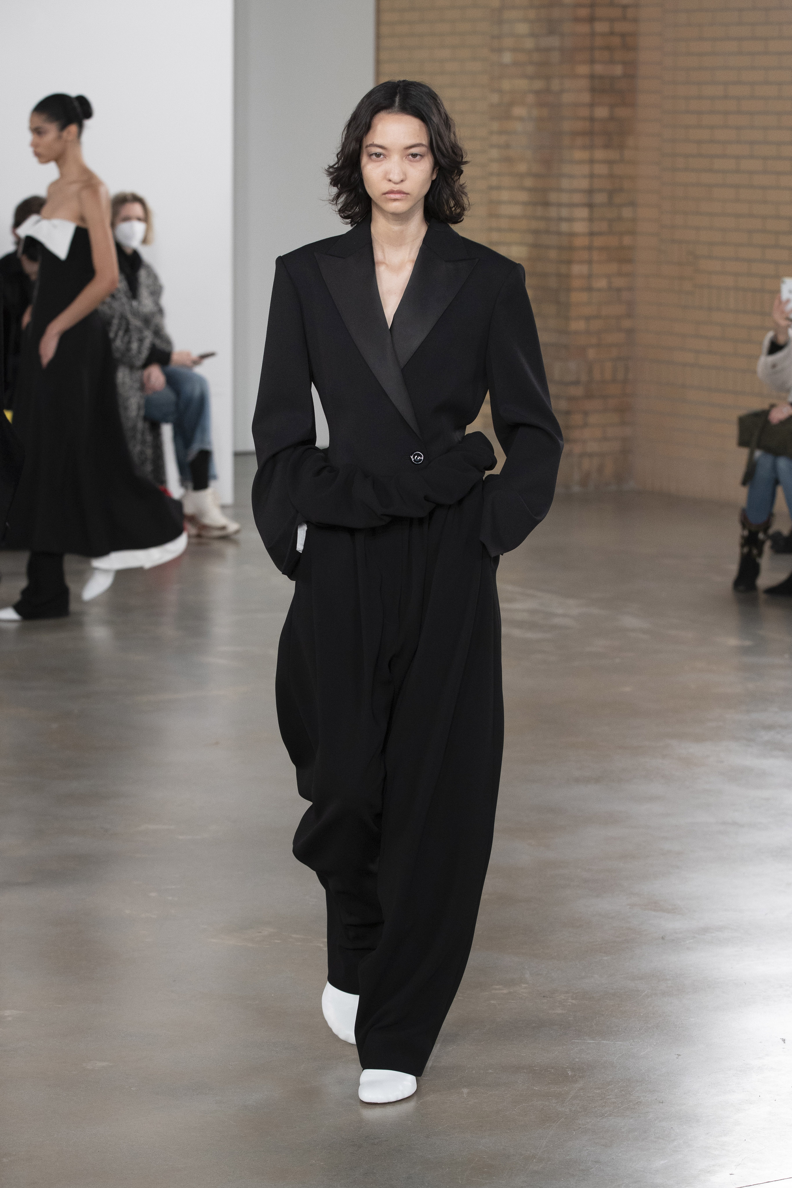 a model wearing proenza schouler's aw22 collection
