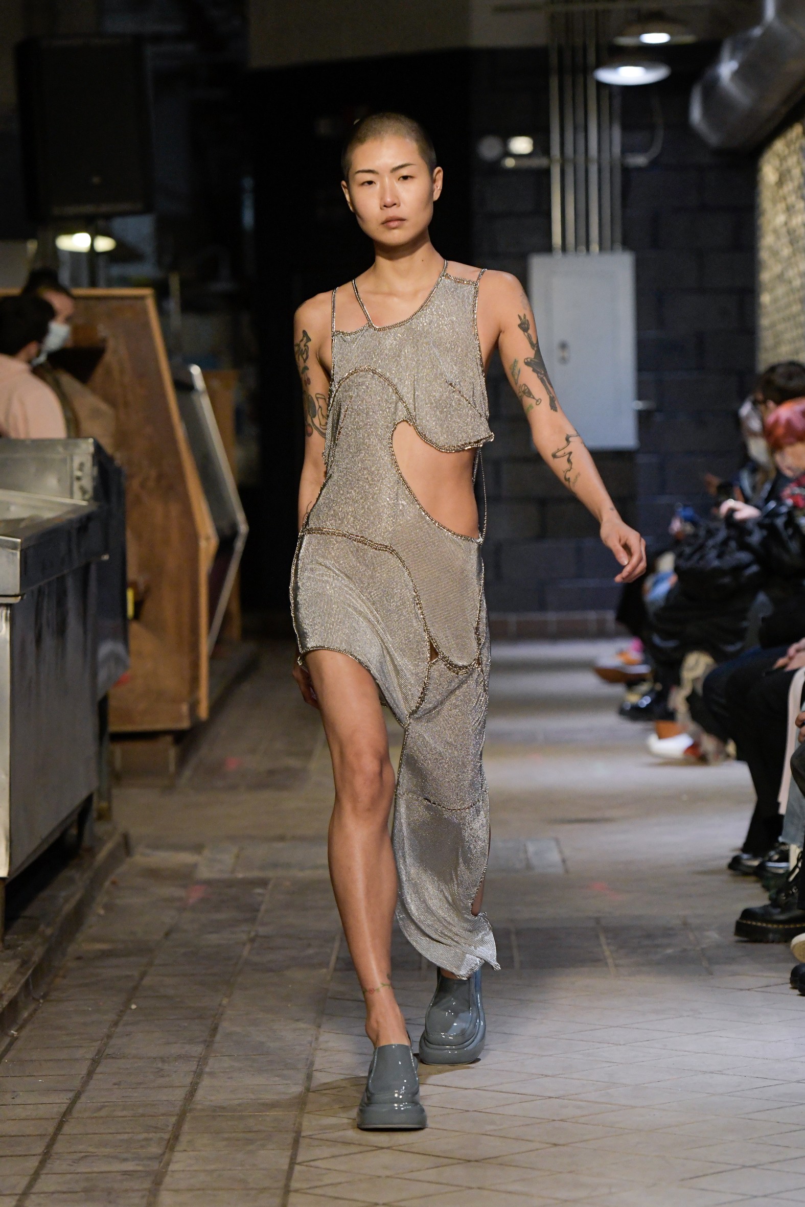 a model walking the runway at eckhaus latta's aw22 show at new york fashion week