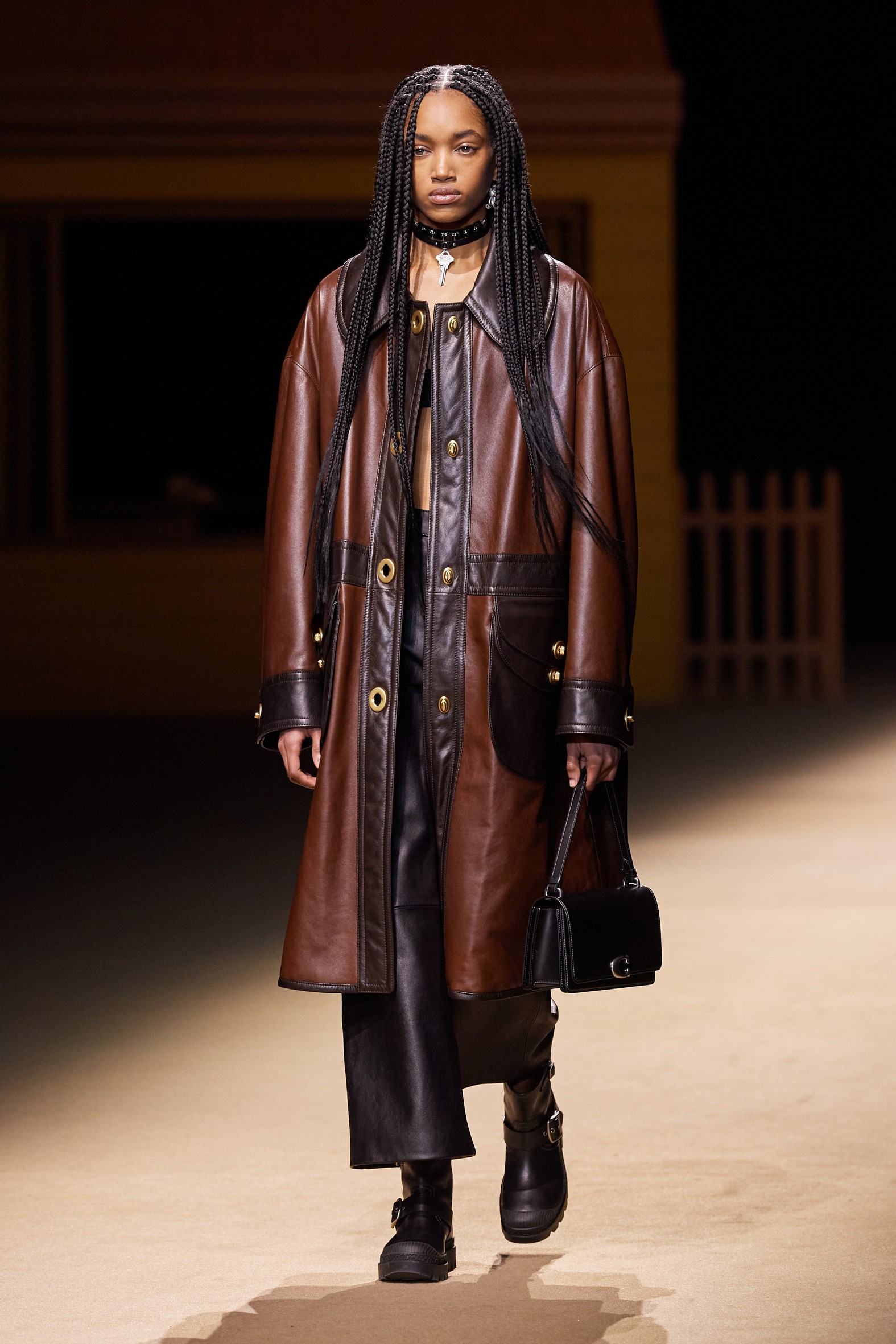 a model walking the runway at Coach's aw22 show at new york fashion week