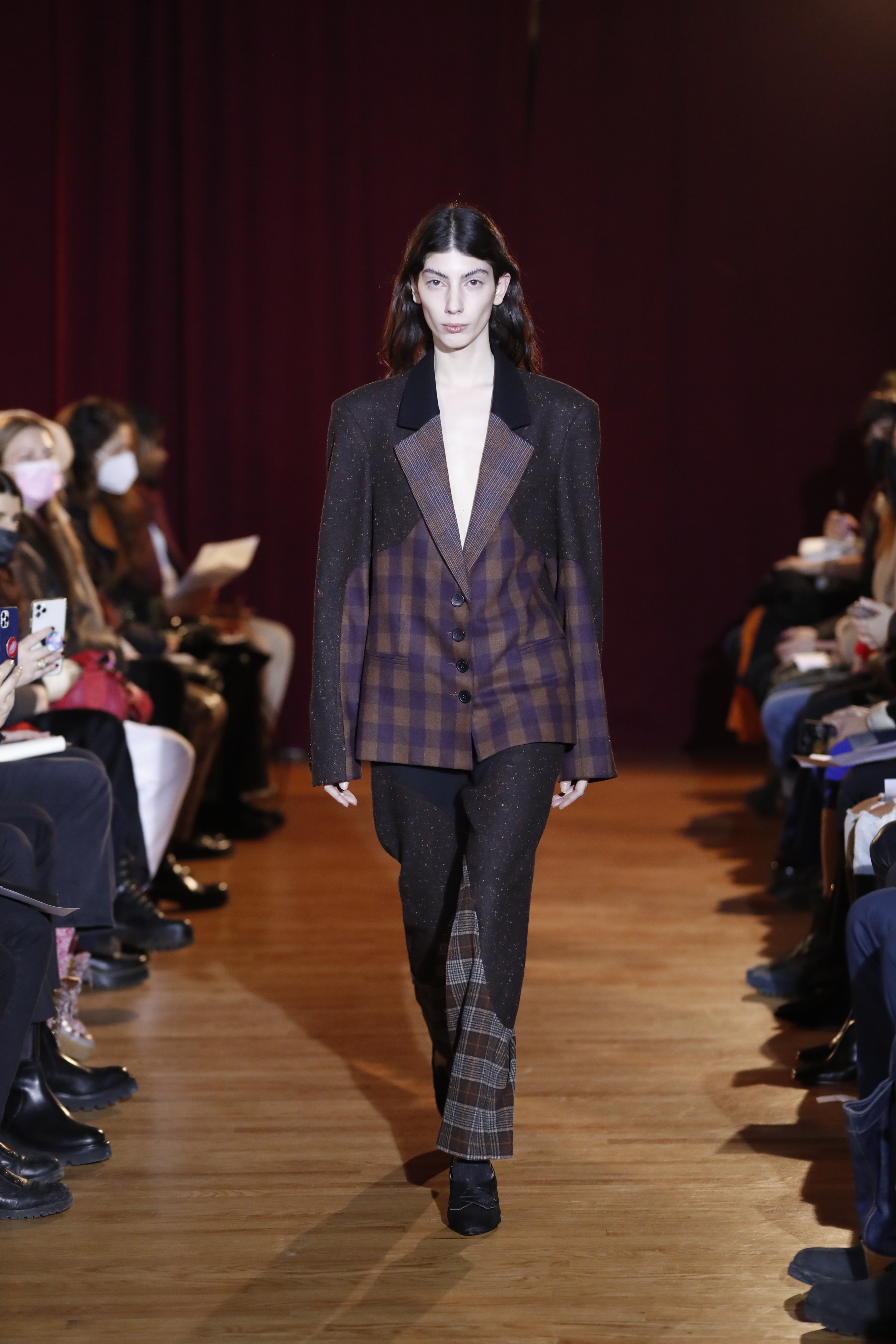 a model walking the runway at puppets and puppets' aw22 show at new york fashion week
