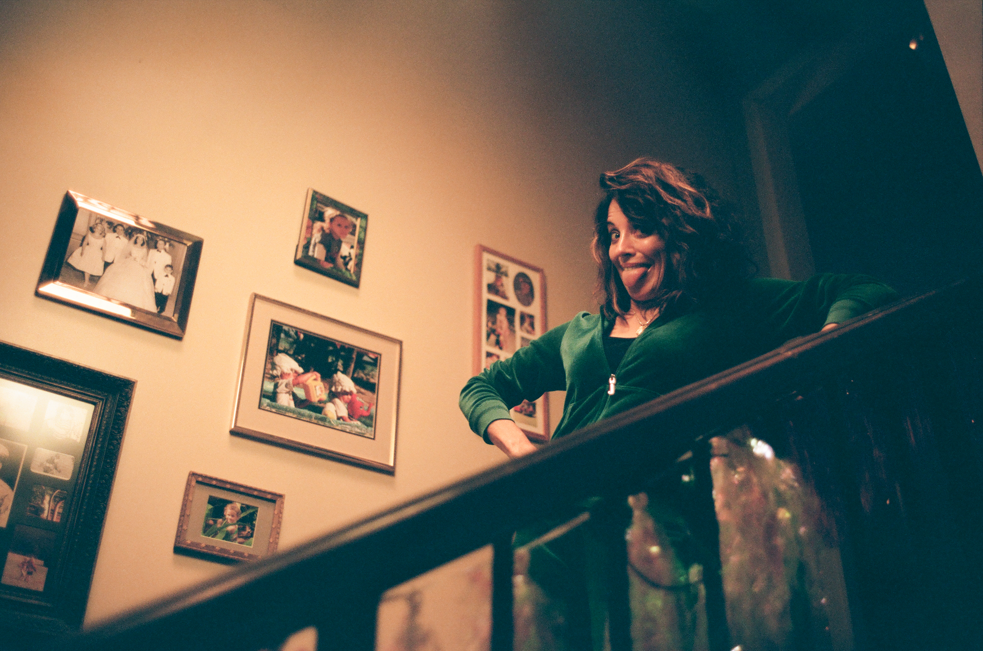 Alanna Ubach posing on the stairs of the Euphoria set