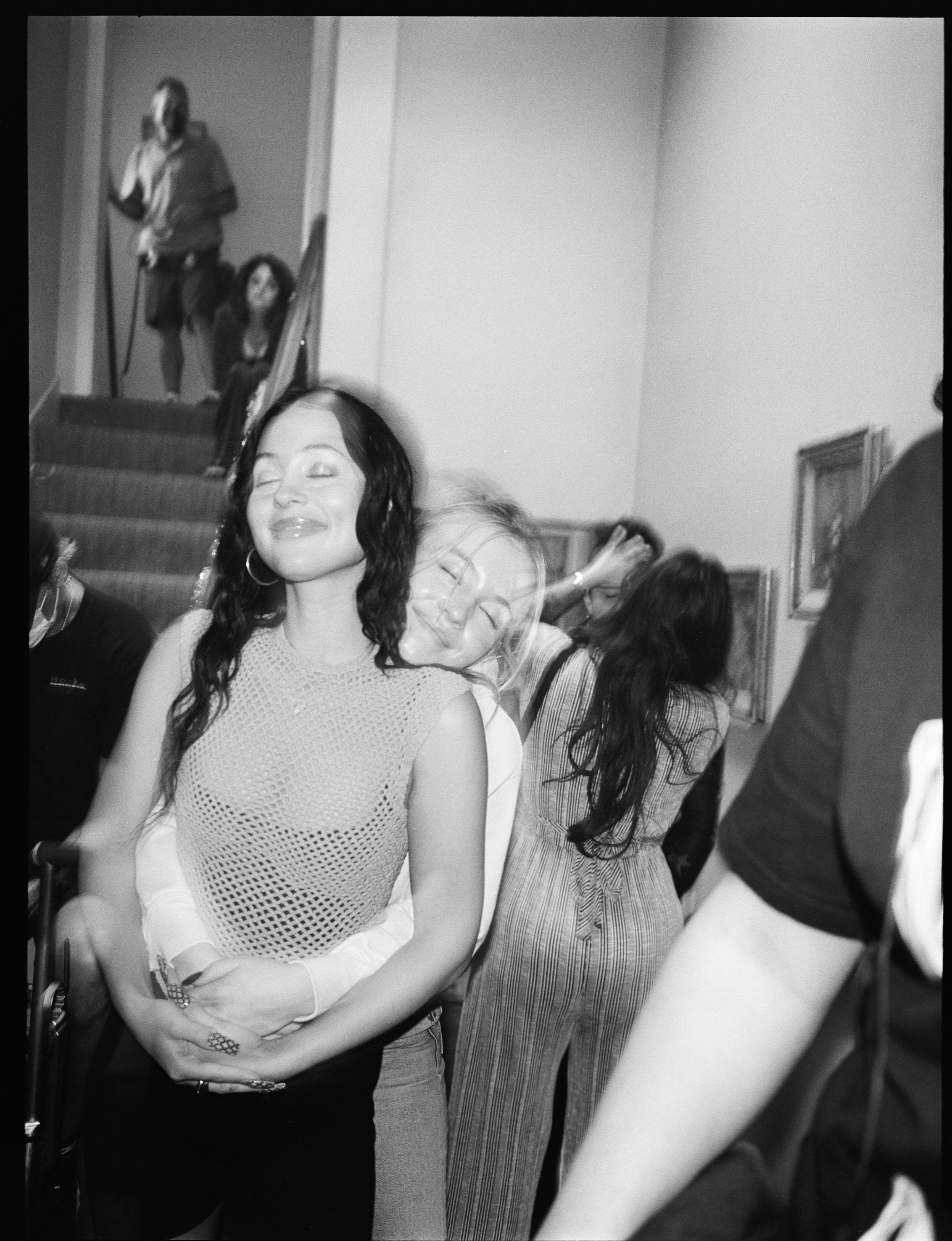 Sydney Sweeney hugs Alexa Demie in black and white behind-the-scenes images