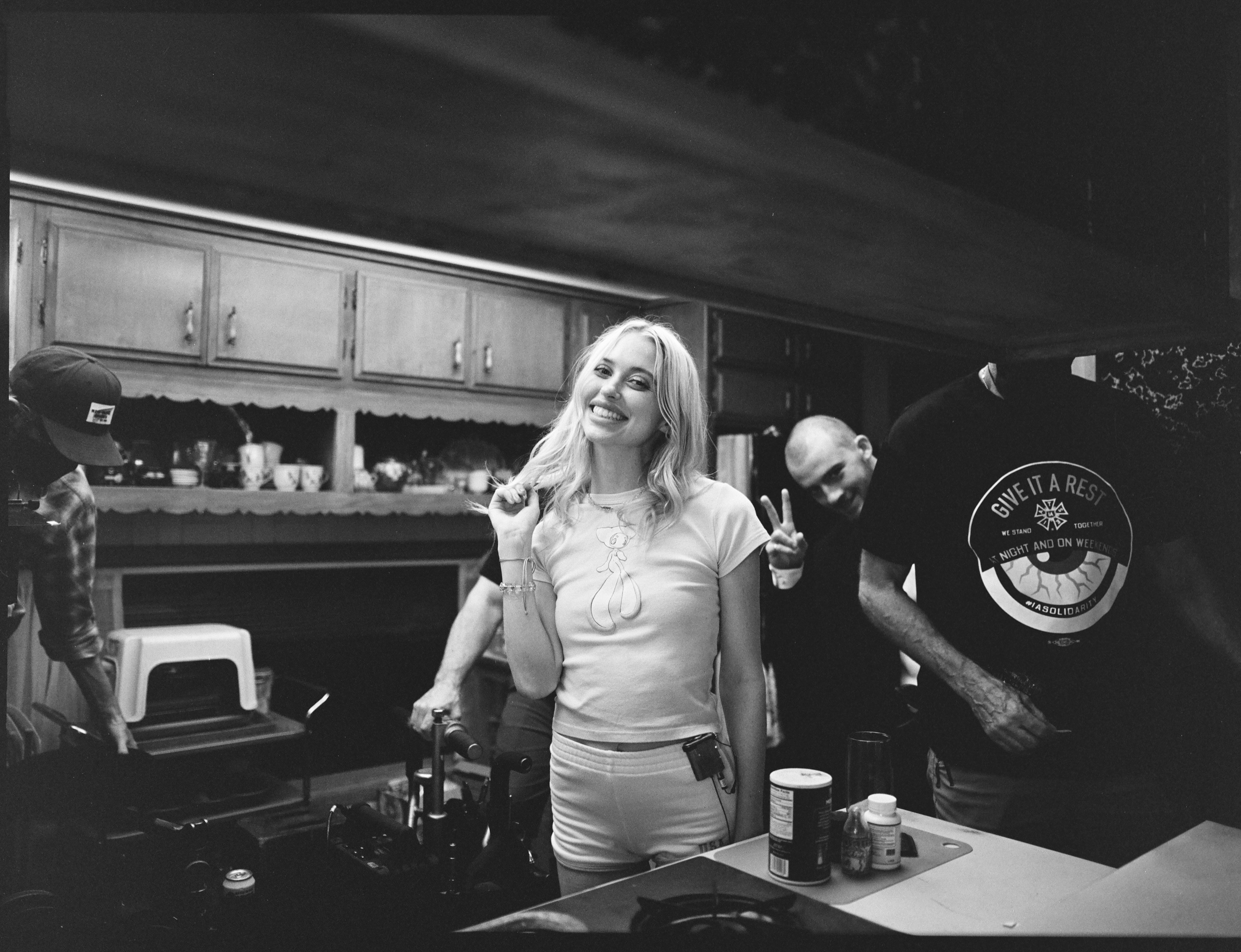 Black and white image of Chloe Cherry behind the scenes of the Euphoria set