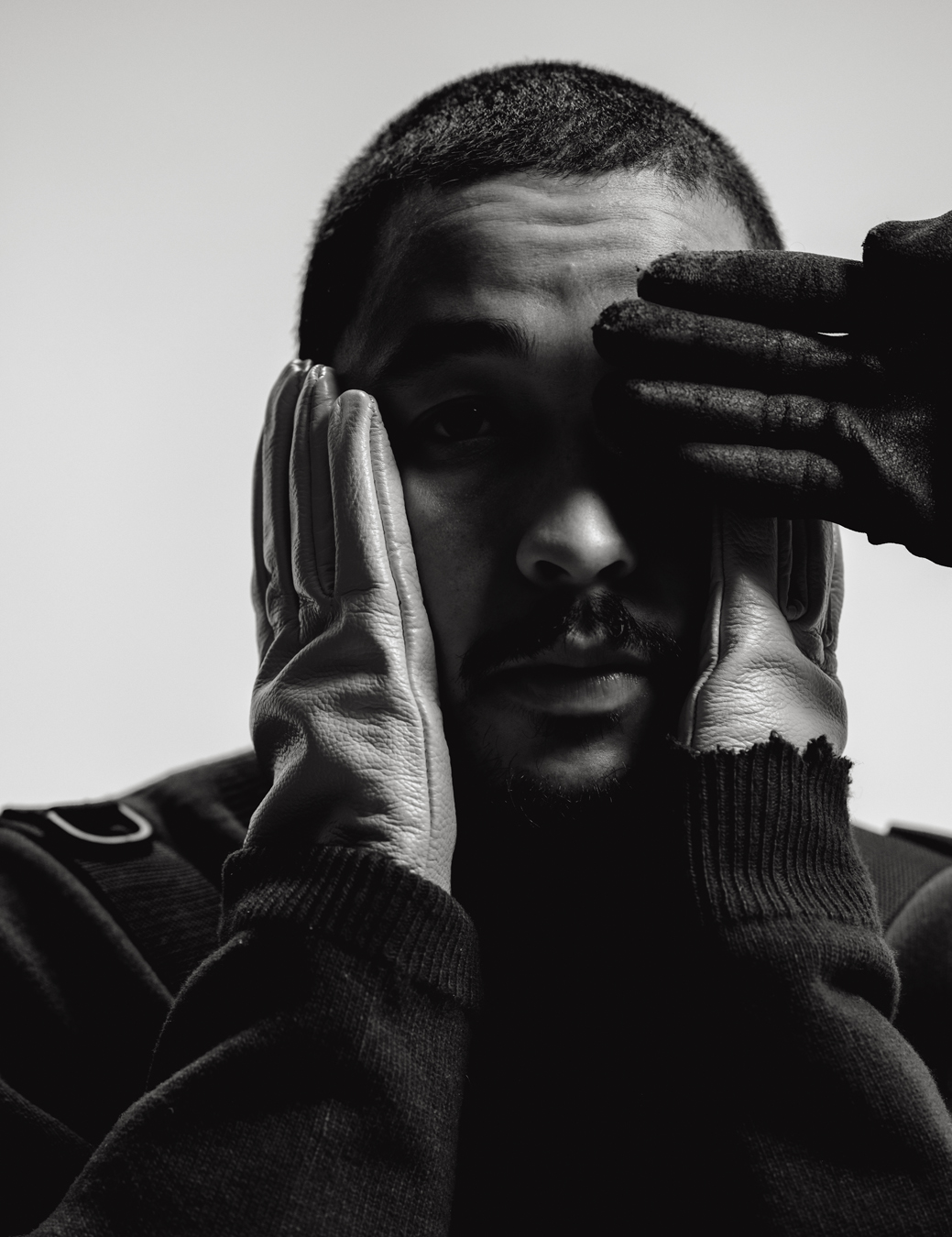 Dijon with his eyes and ears covered by gloves in i-D 367 The Out Of Body Issue