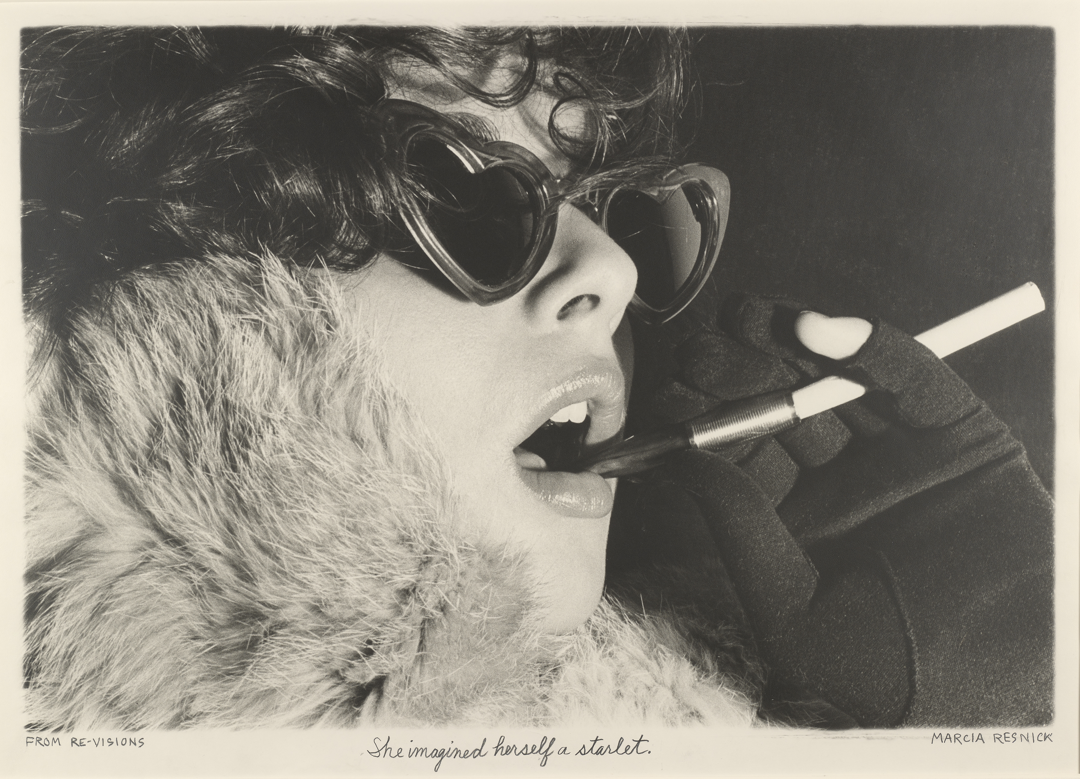 Photograph of a model wearing heart sunglasses and holding a cigarette photographed by Marcia Resnick