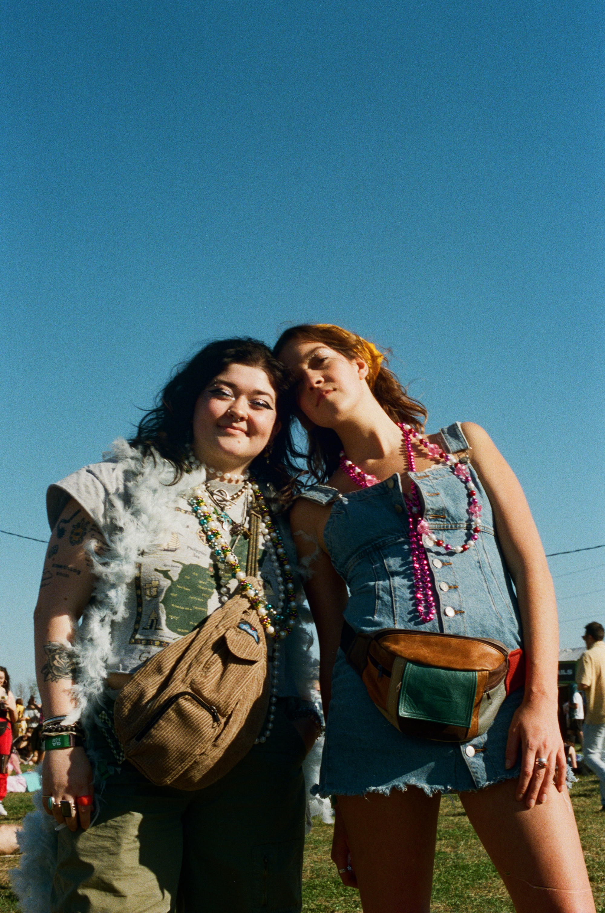 two girls posing at buku music + arts festival in new orleans