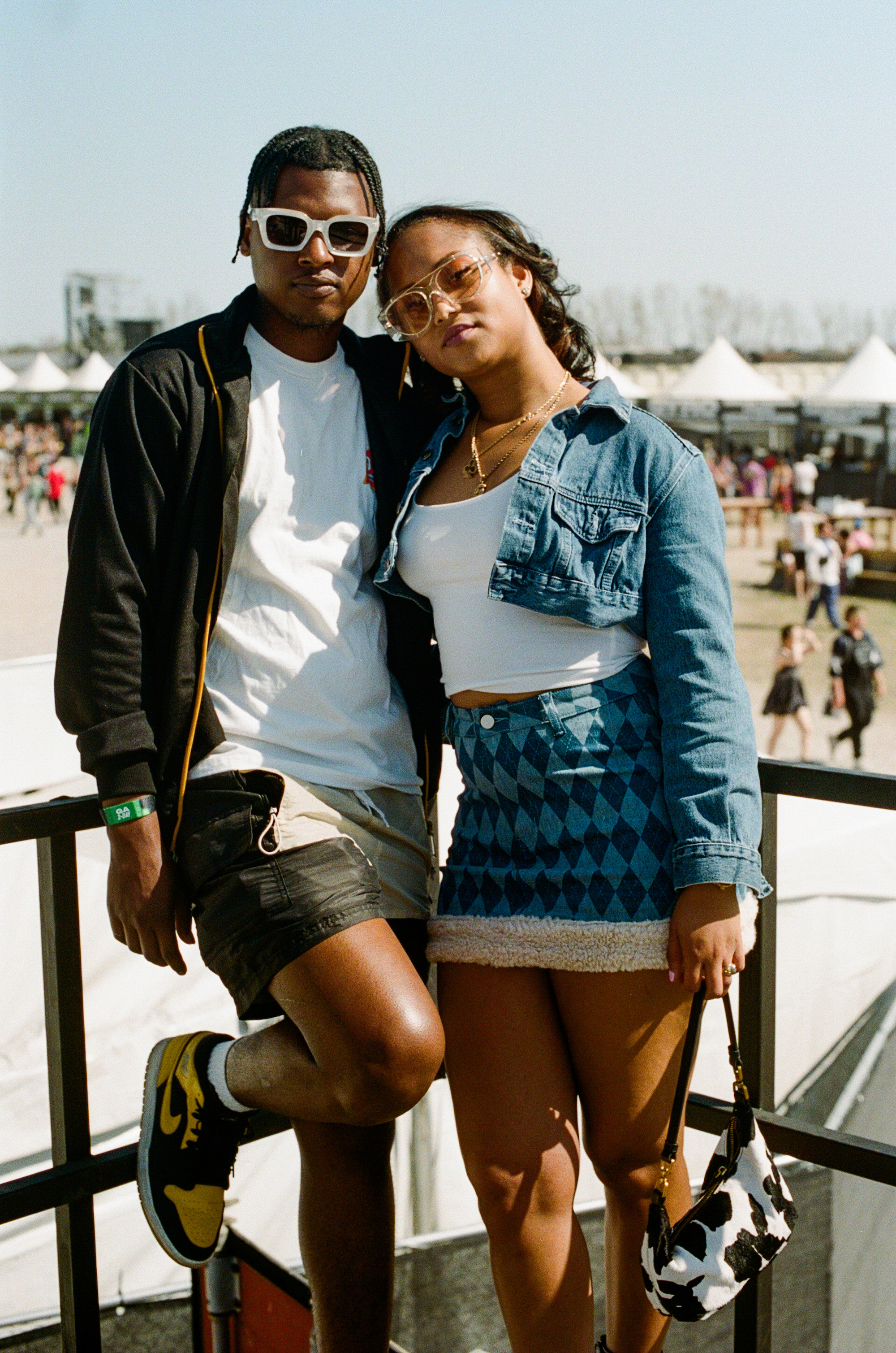 two people posing at buku music + arts festival in new orleans