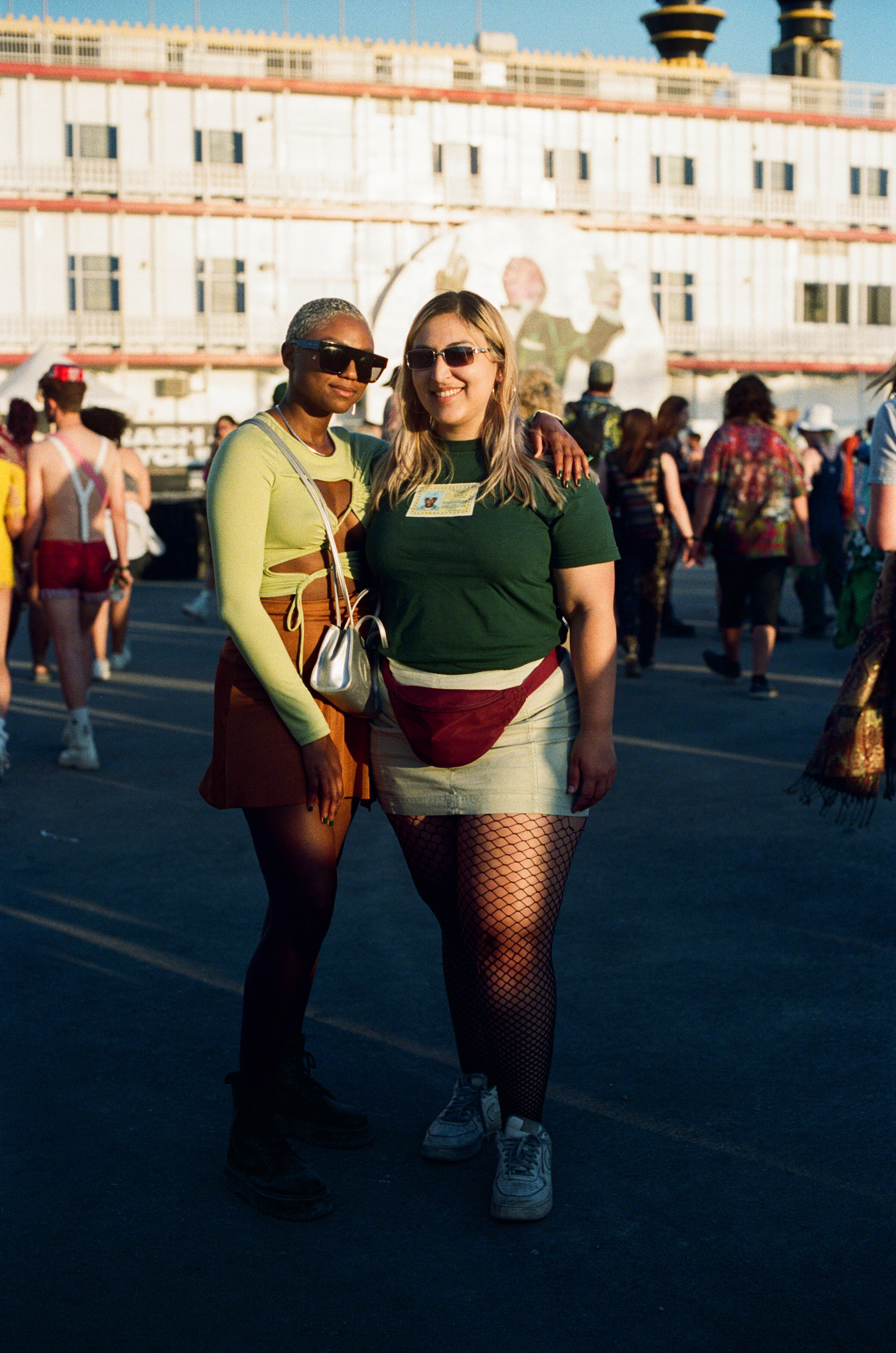 two people posing at buku music + arts festival in new orleans