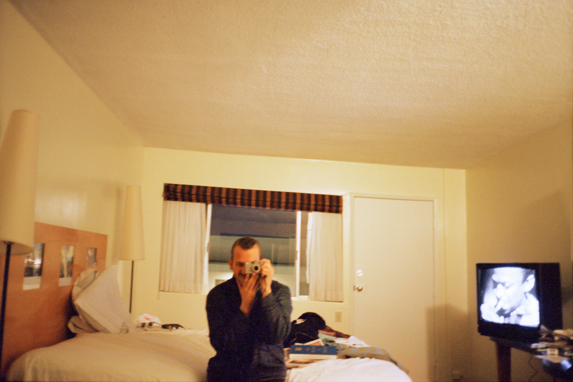 self portrait in a hotel room by photographer jason dill