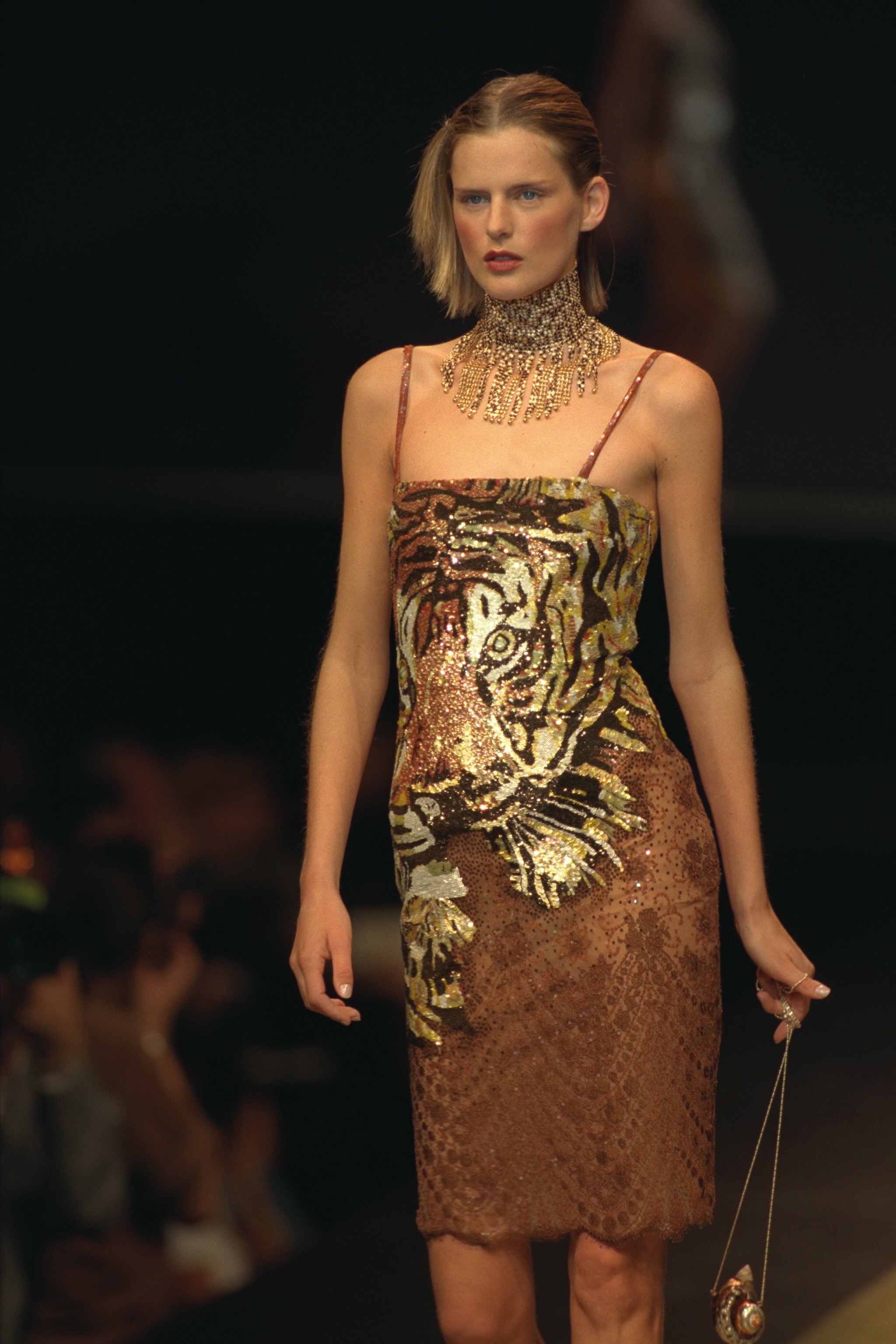 Stella Tennant walking for Valentino SS98 show in a sequin tiger dress