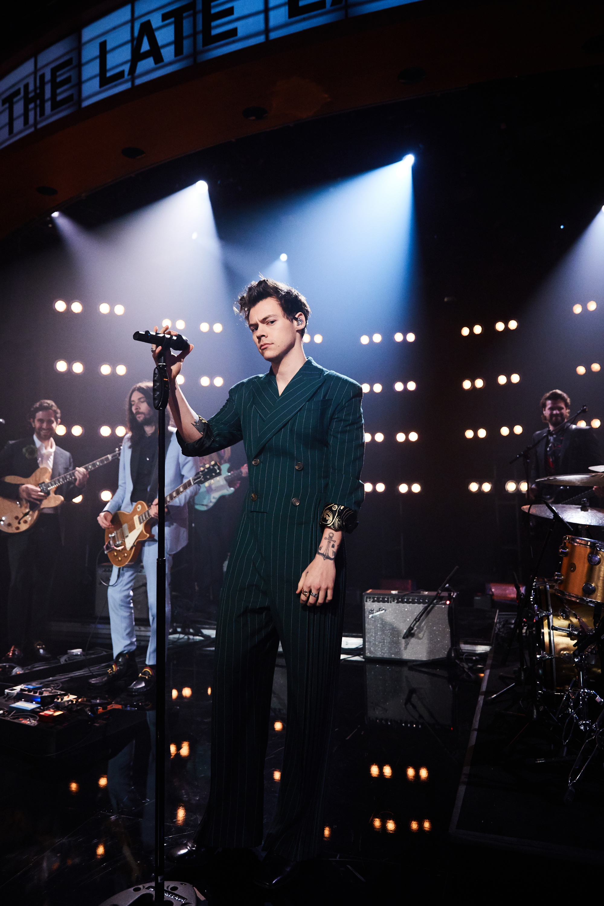 Harry Styles in a striped Charles Jeffrey Loverboy suit on the Late Late show.