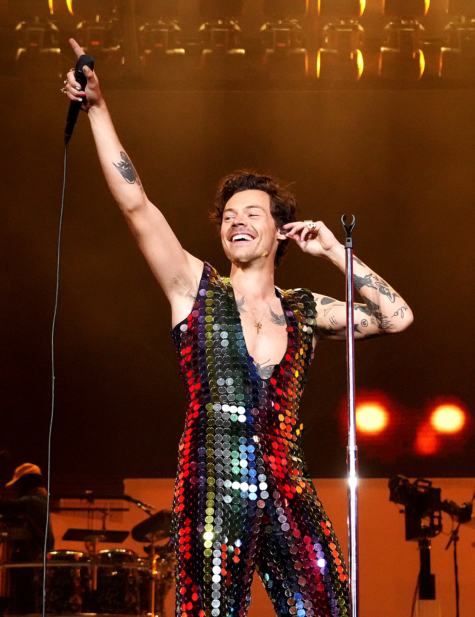 Harry Styles in a shimmering jumpsuit at Coachella in 2022