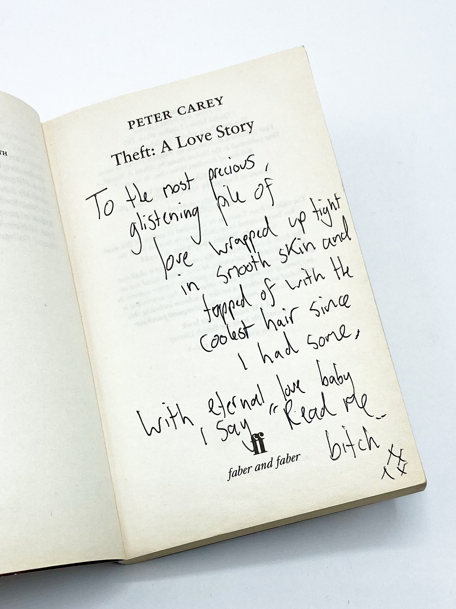 An inscription on a Peter Carey book