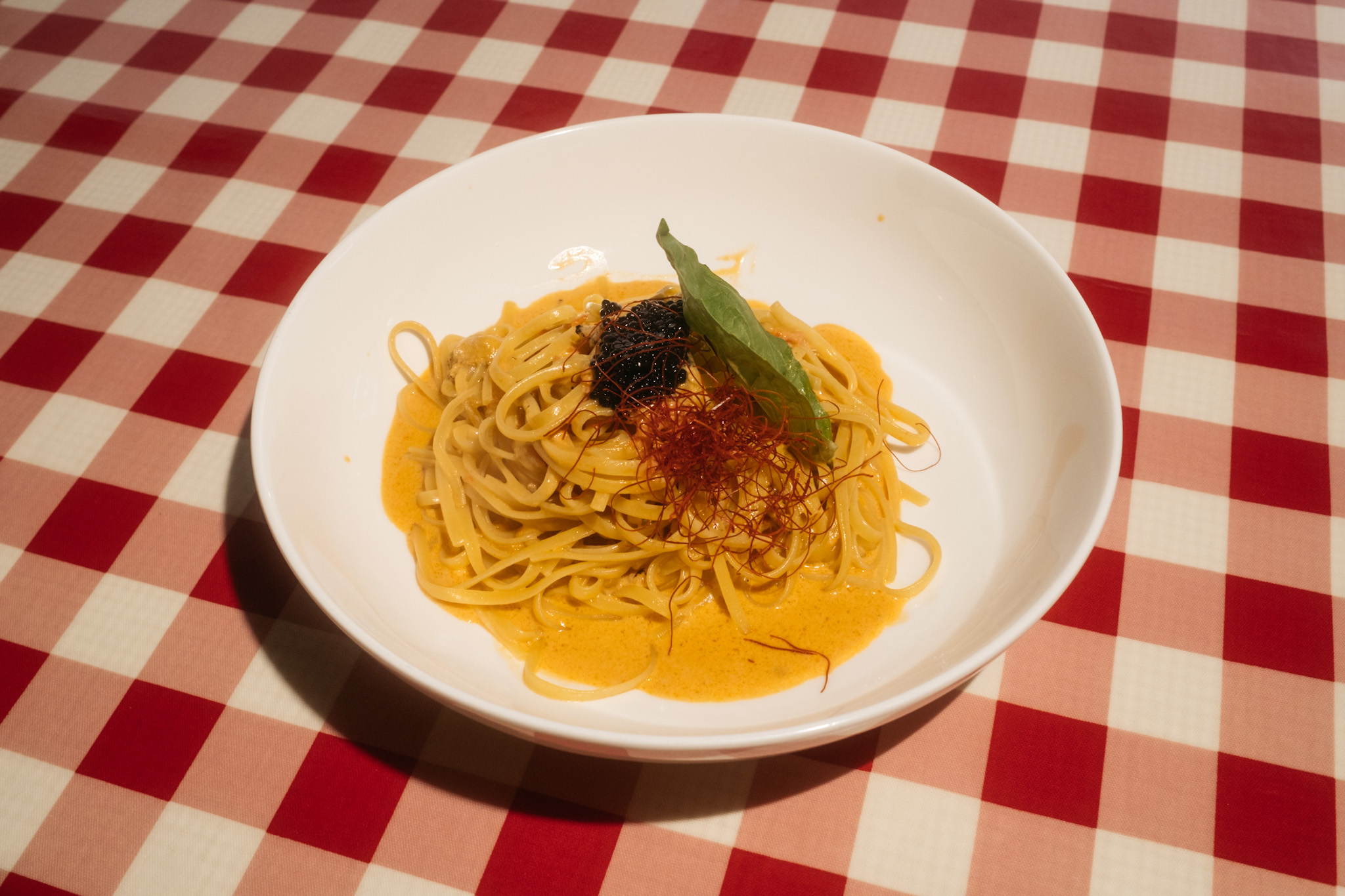 Trattoria Nakamura-Ya's uni and tomato cream sauce linguini with caviar.