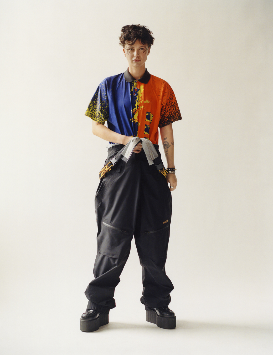 model wearing a polo and tracksuit bottoms  in i-D 369 the Earthrise issue
