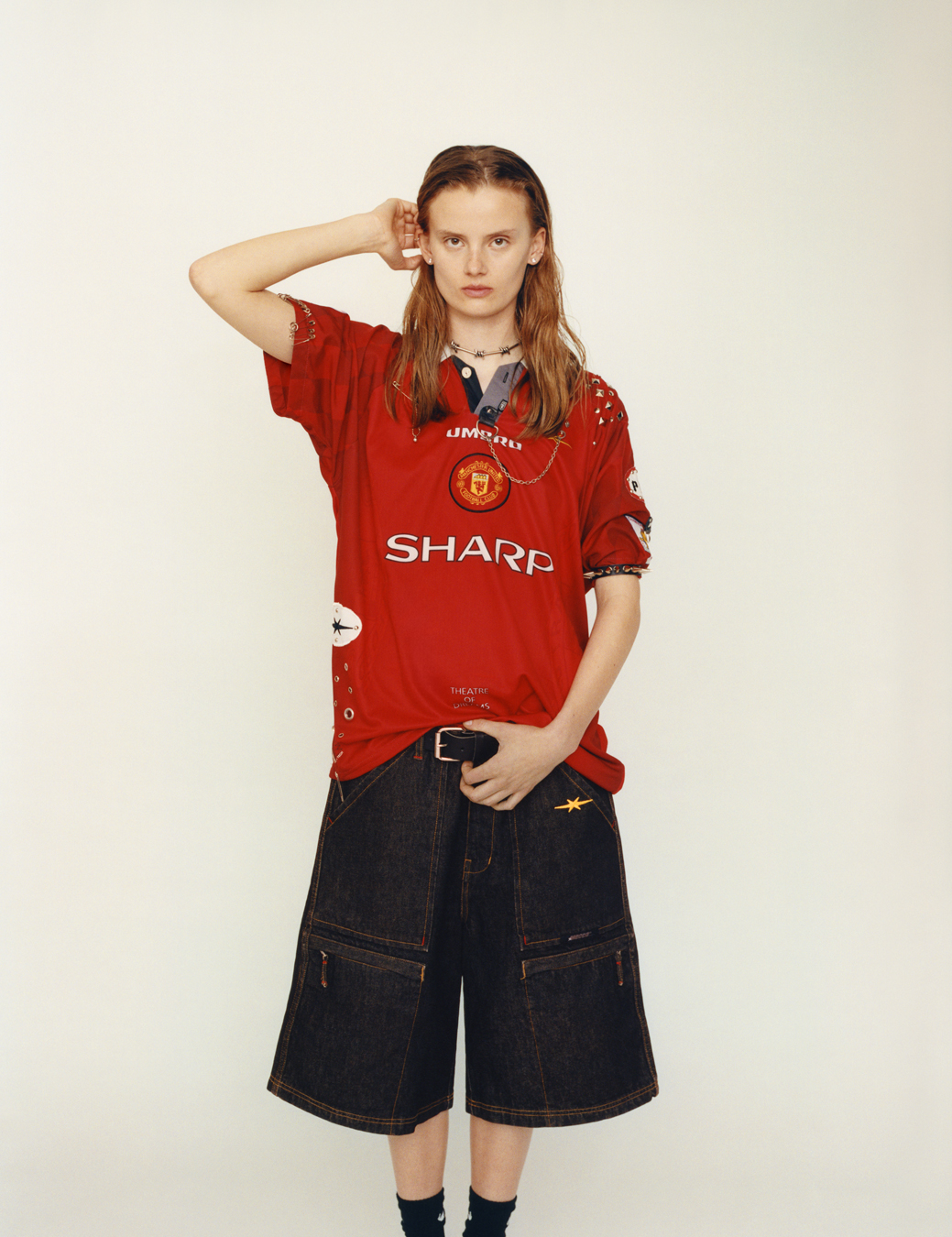 model wearing a football top and shorts  in i-D 369 the Earthrise issue