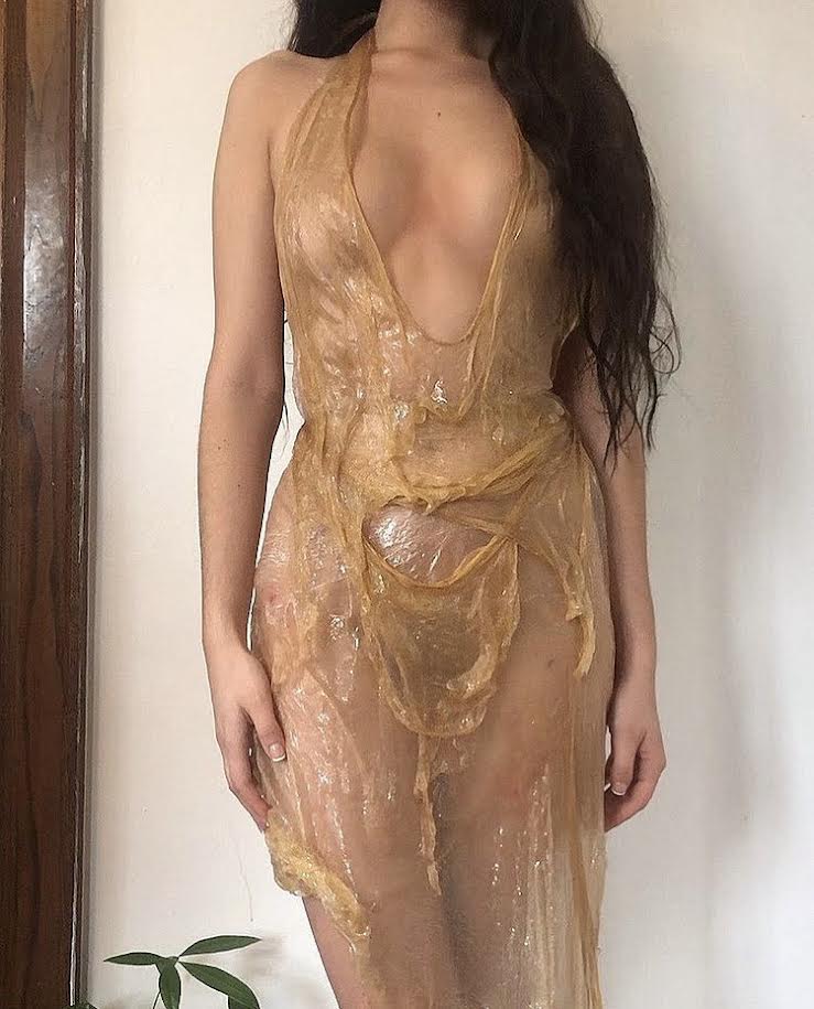 a close up of a sheer silicone dress by ella simone