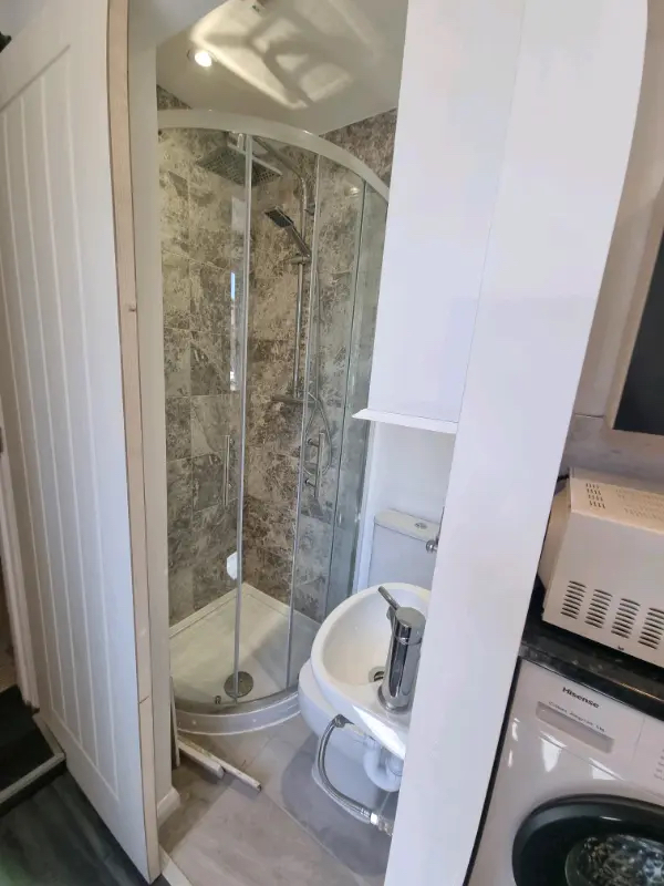 A studio flat in Slough showing the tiny bathroom