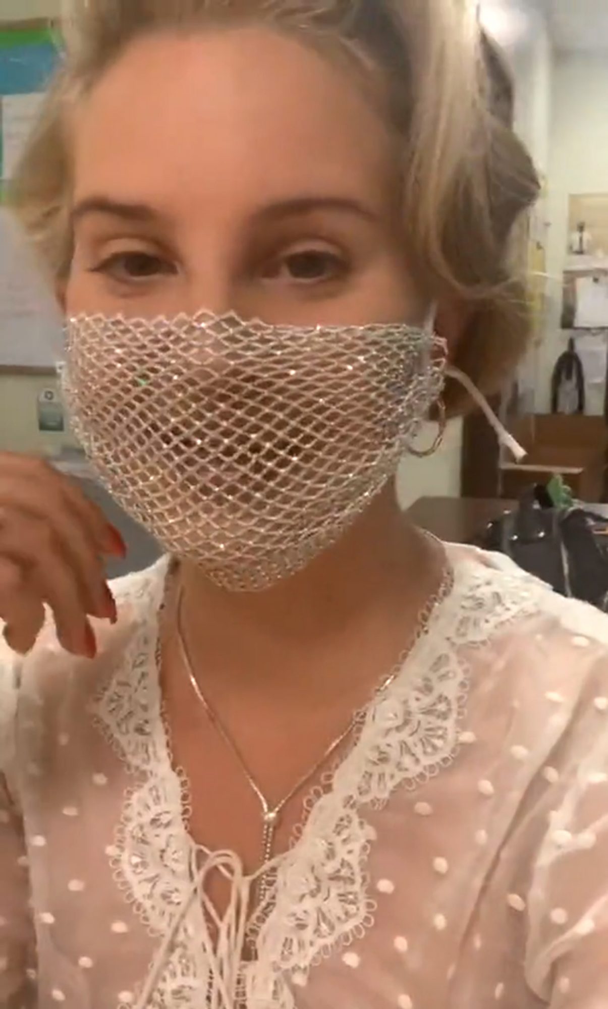 Lana Del Rey in a mesh mask on Instagram
