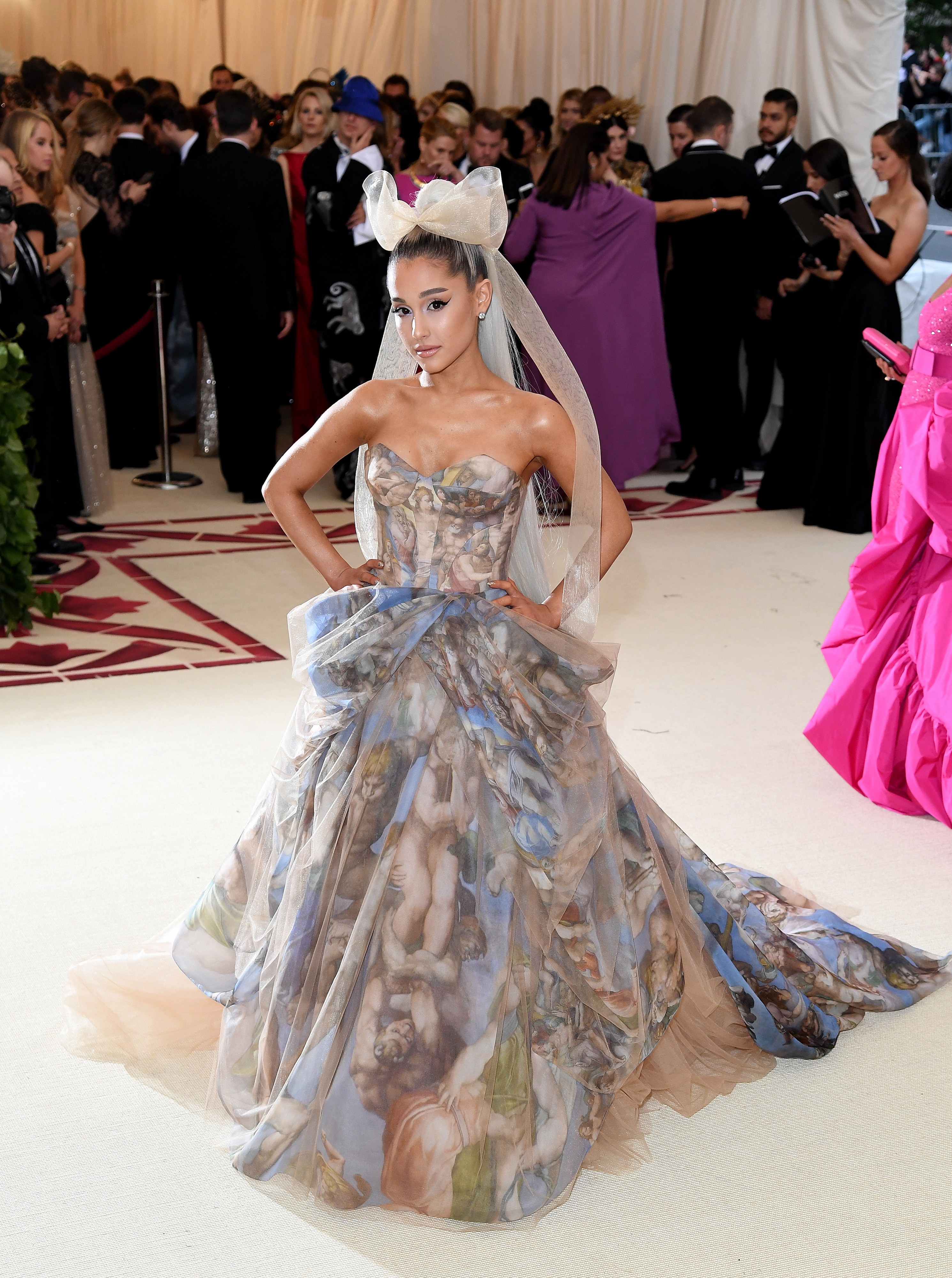 Ariana Grande in a vera wang gown printed with the Michelangelo painted ceiling of the Sistine Chapel at the Heavenly Bodies Met Gala in 2018