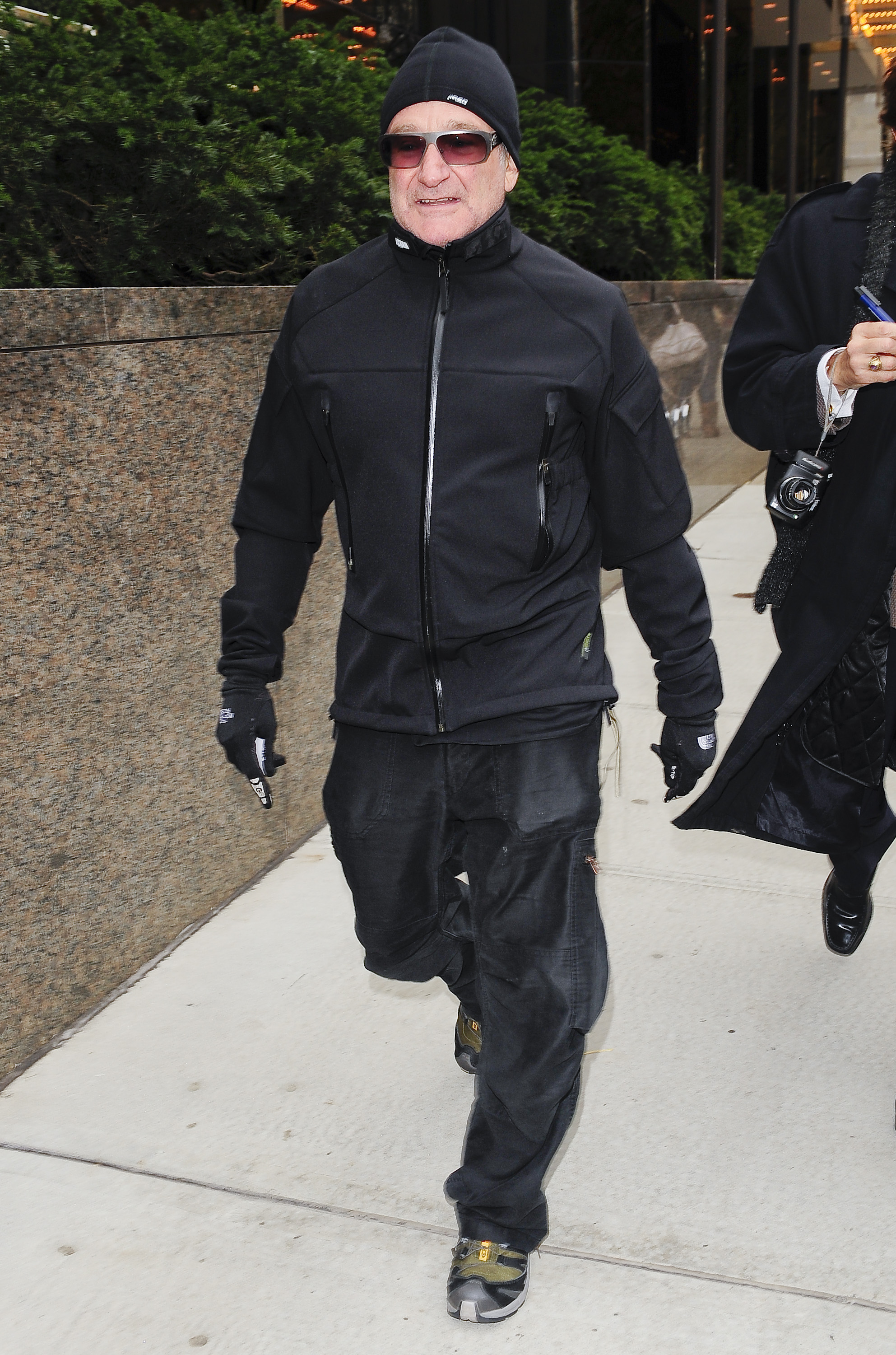 Robin Williams wearing the J-16 jacket from Acronym with North Face in 2009