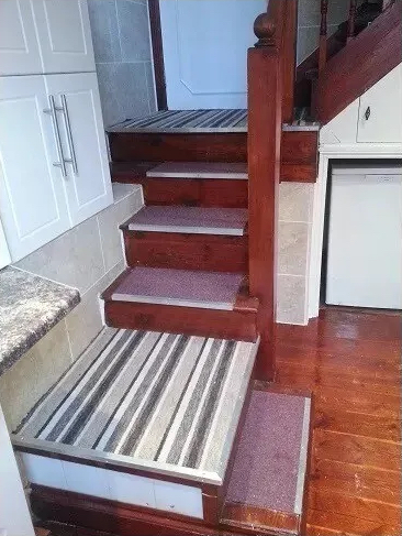 The stairs in a double mezzanine studio to rent in Vauxhall, London