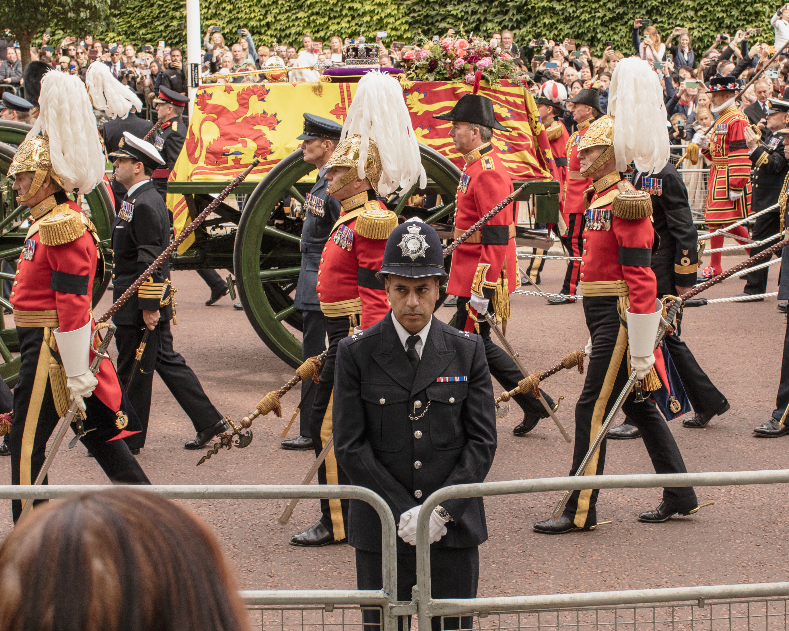 Police officer with back towards Queen's coffin during Queen Elizabeth II's funeral