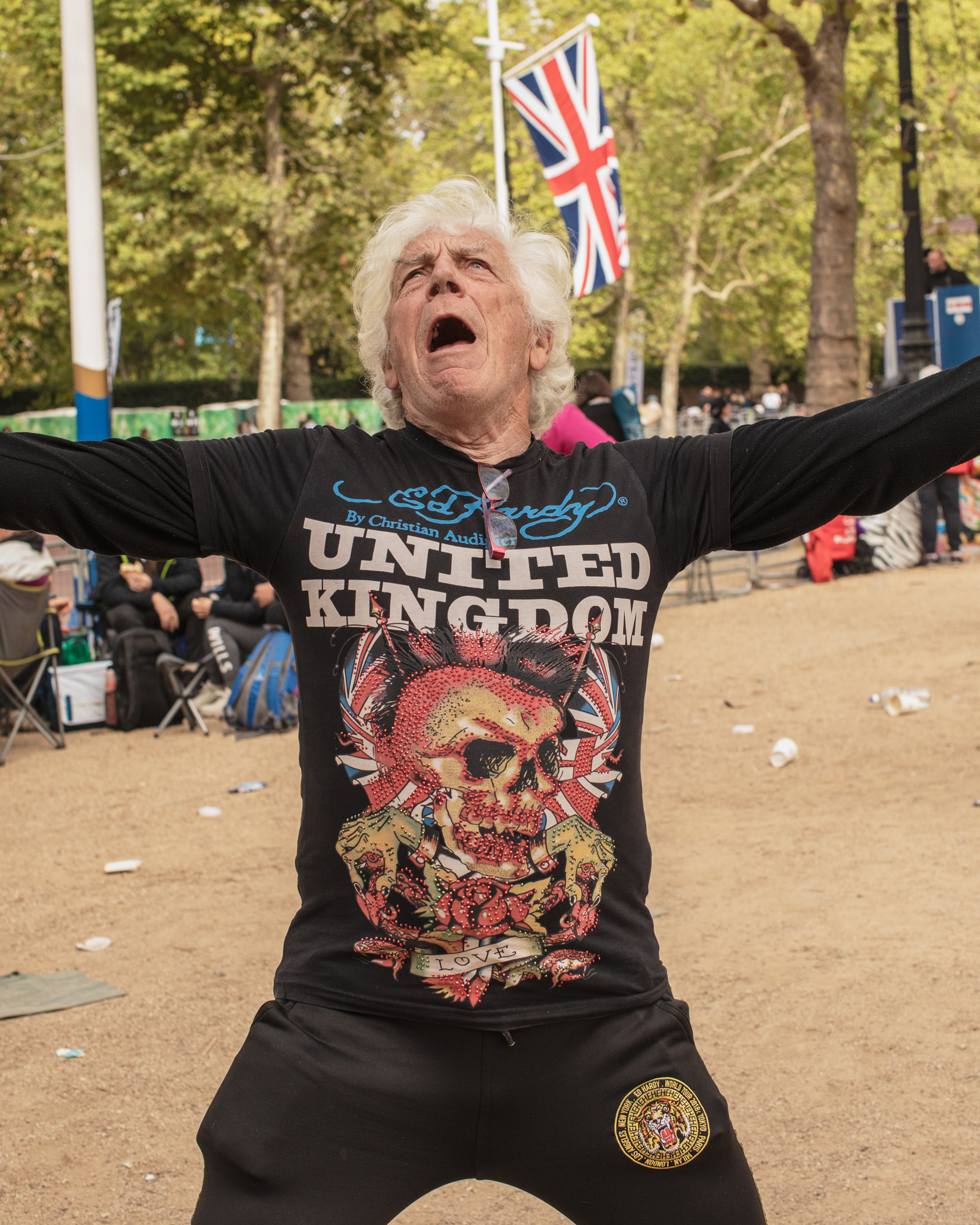 Man with heavy metal T-shirt during Queen Elizabeth II's funeral