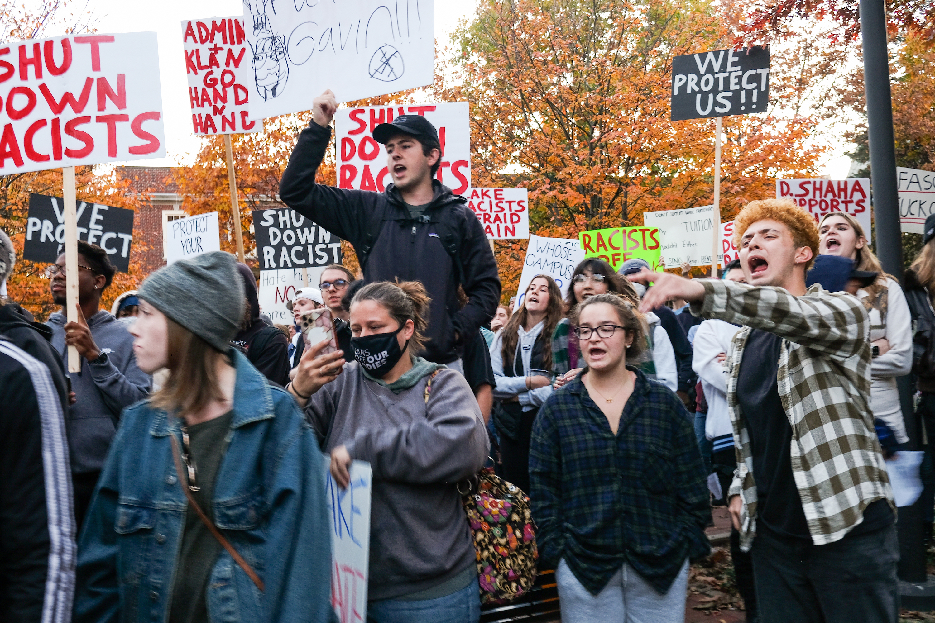 Hundreds of students and their allies turned out to protest the “Stand Back & Stand By” event on Penn State campus. Photo by Tess Owen.