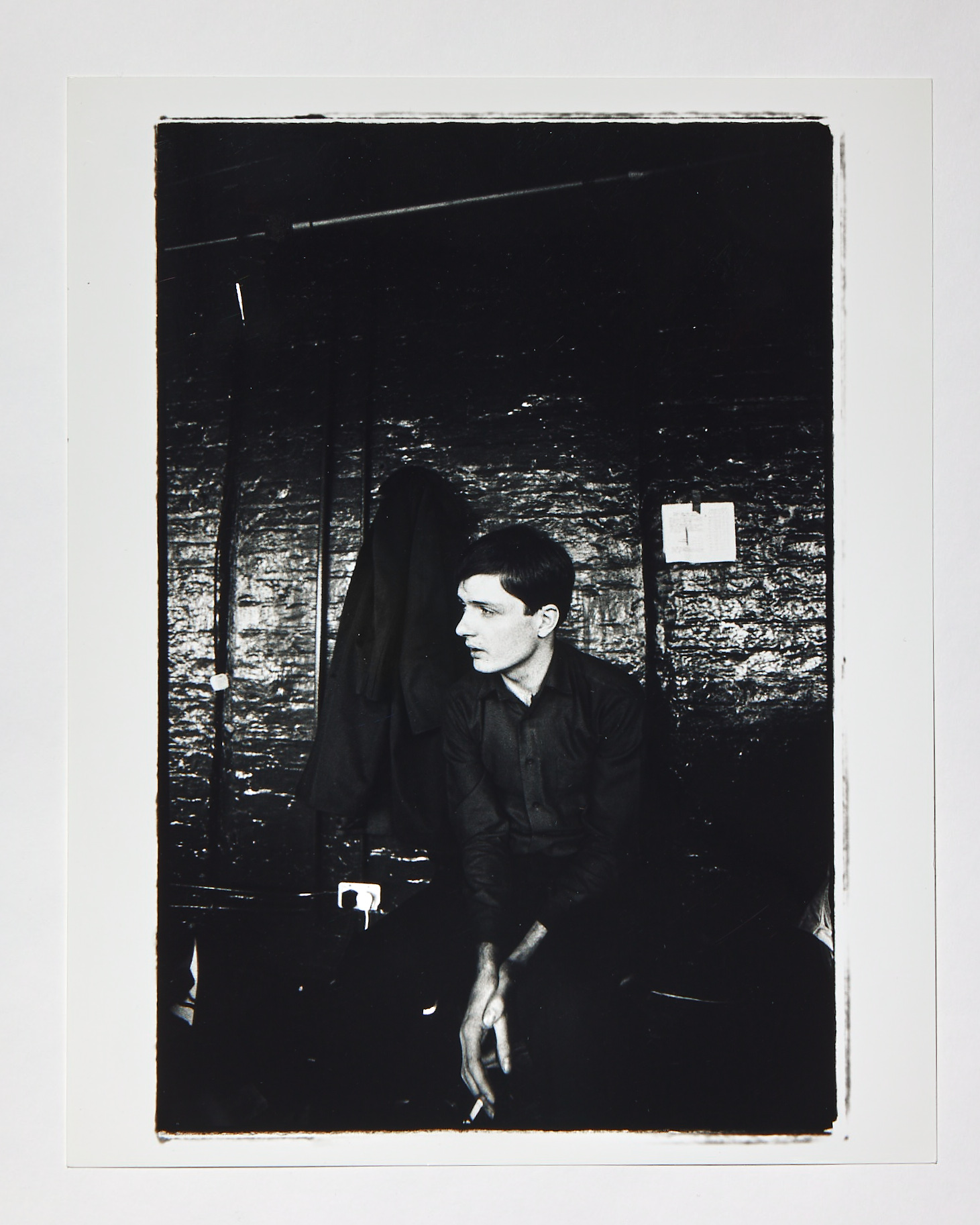 a black and white portrait of ian curtis of joy division by kevin cummins