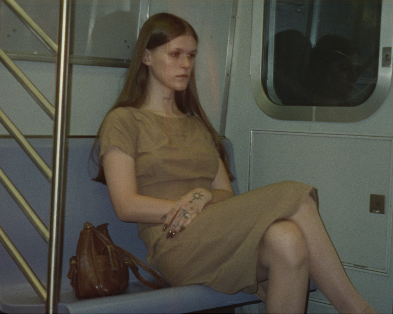 Photograph of Ethel Cain on the subway train in a photograph by Silken Weinberg featured in i-D’s The Royalty Issue, no. 370, Winter 2022