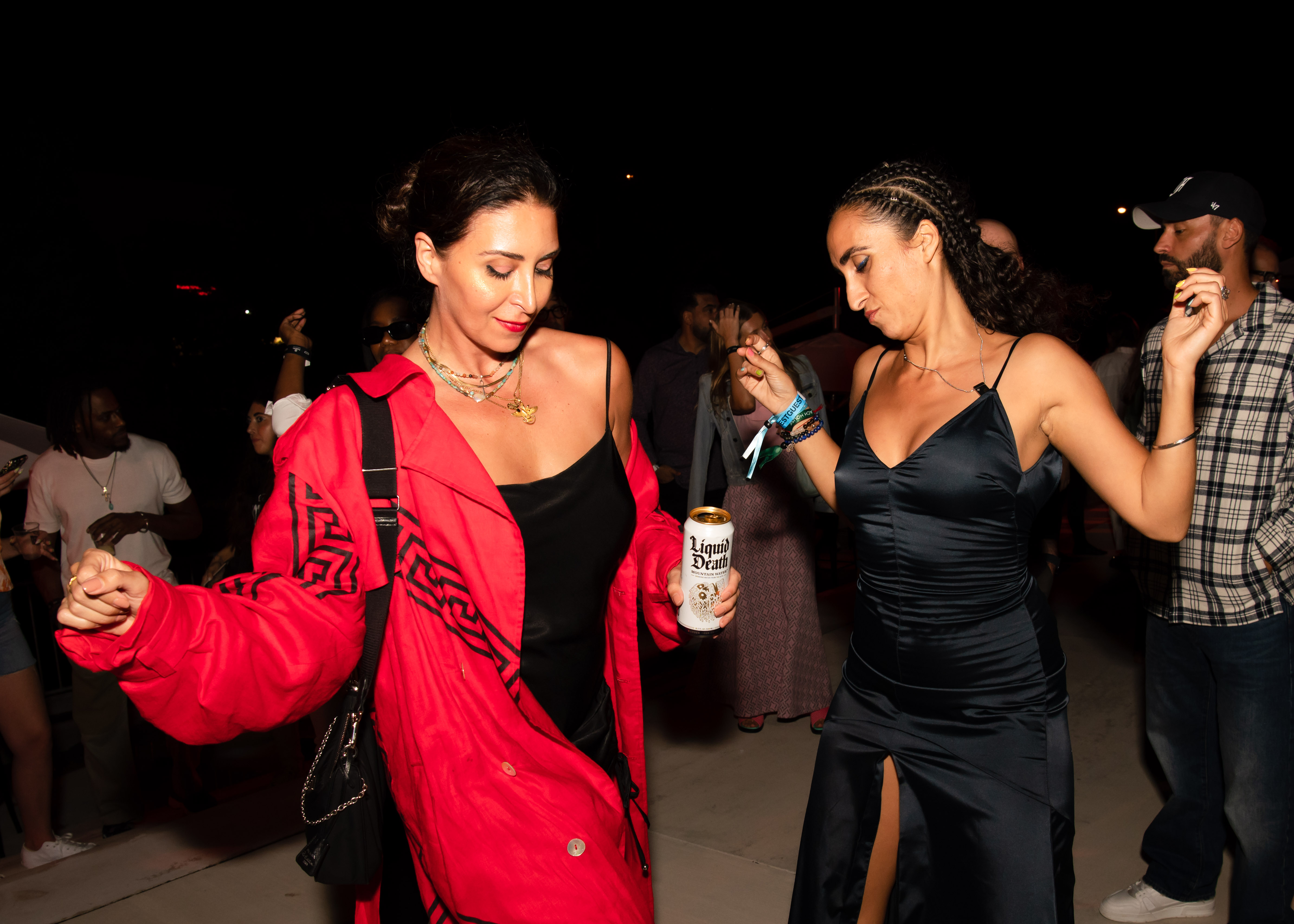 Two women dancingn at Art Basel Miami