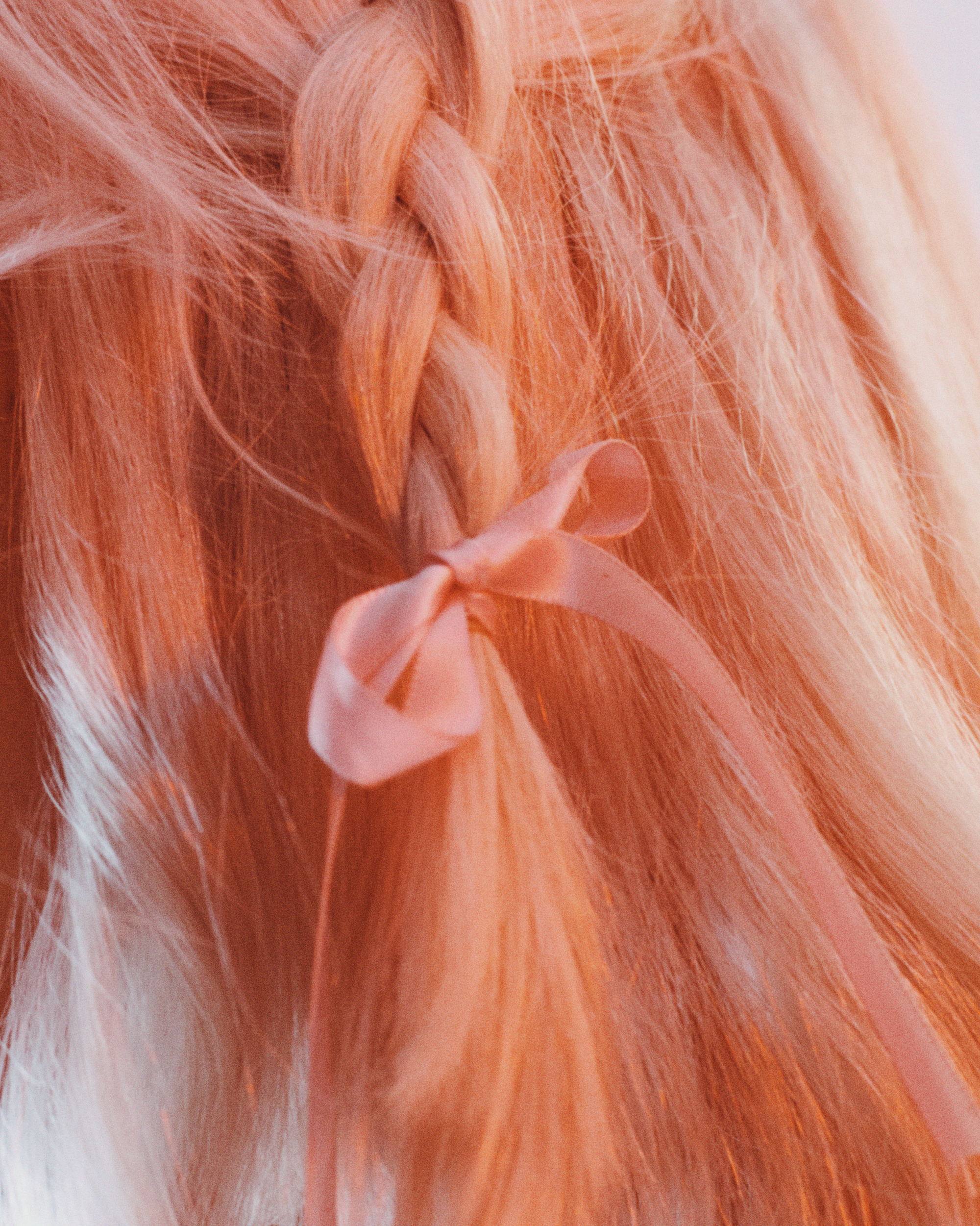 Close up of the bow in Peach PRC's hair photographed by James Tolich for i-D magazine