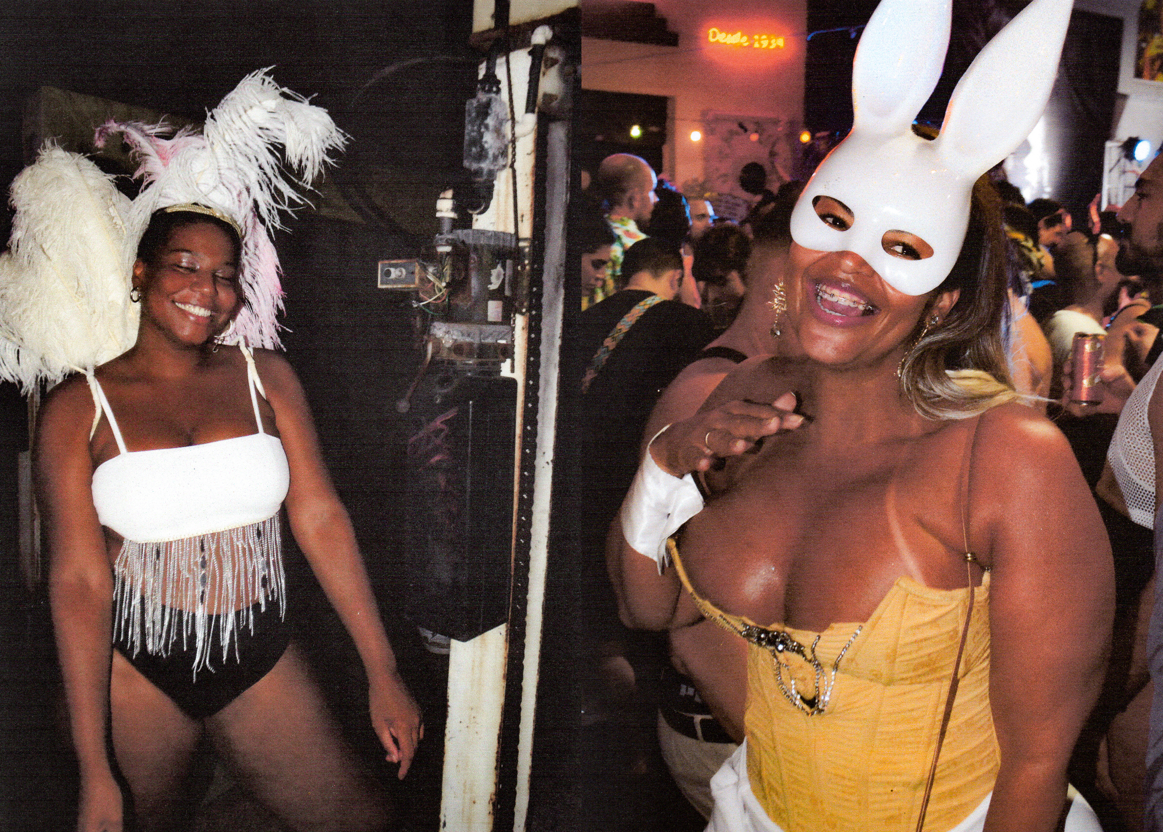 a woman wearing feathers smiles; a woman in a bustier and white rabbit mask poses to camera in a club
