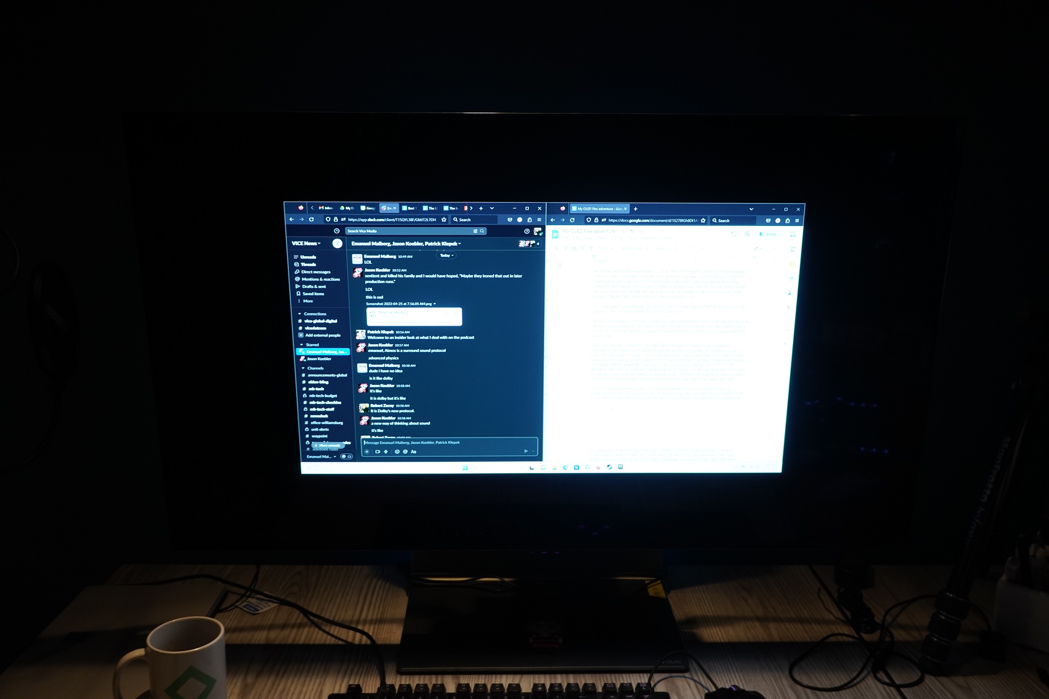 A split display of a discord window and a text document side by side in windows across a 27-inch dispay area withing a 42 inch screen.
