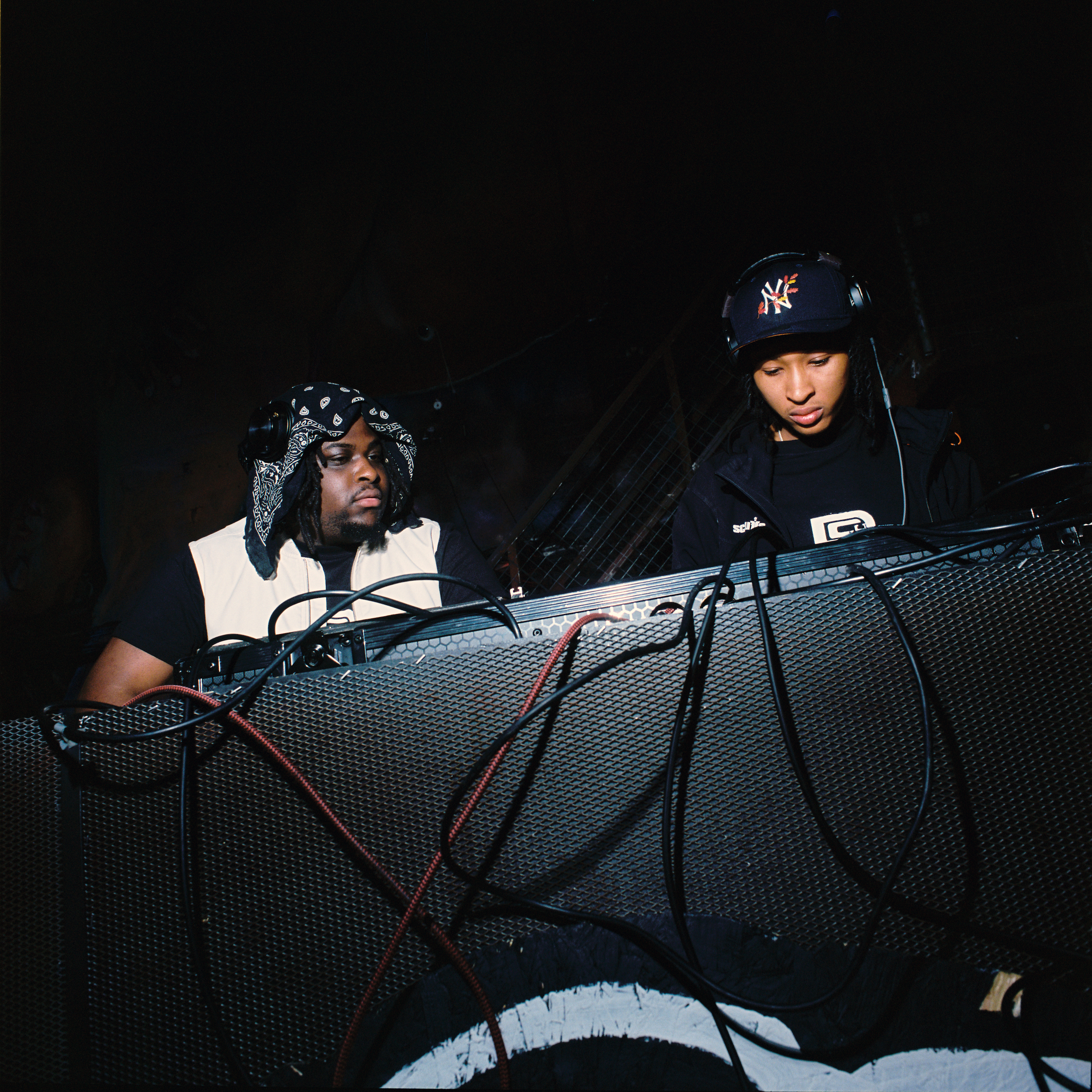 two people in a dj booth in london's da community event