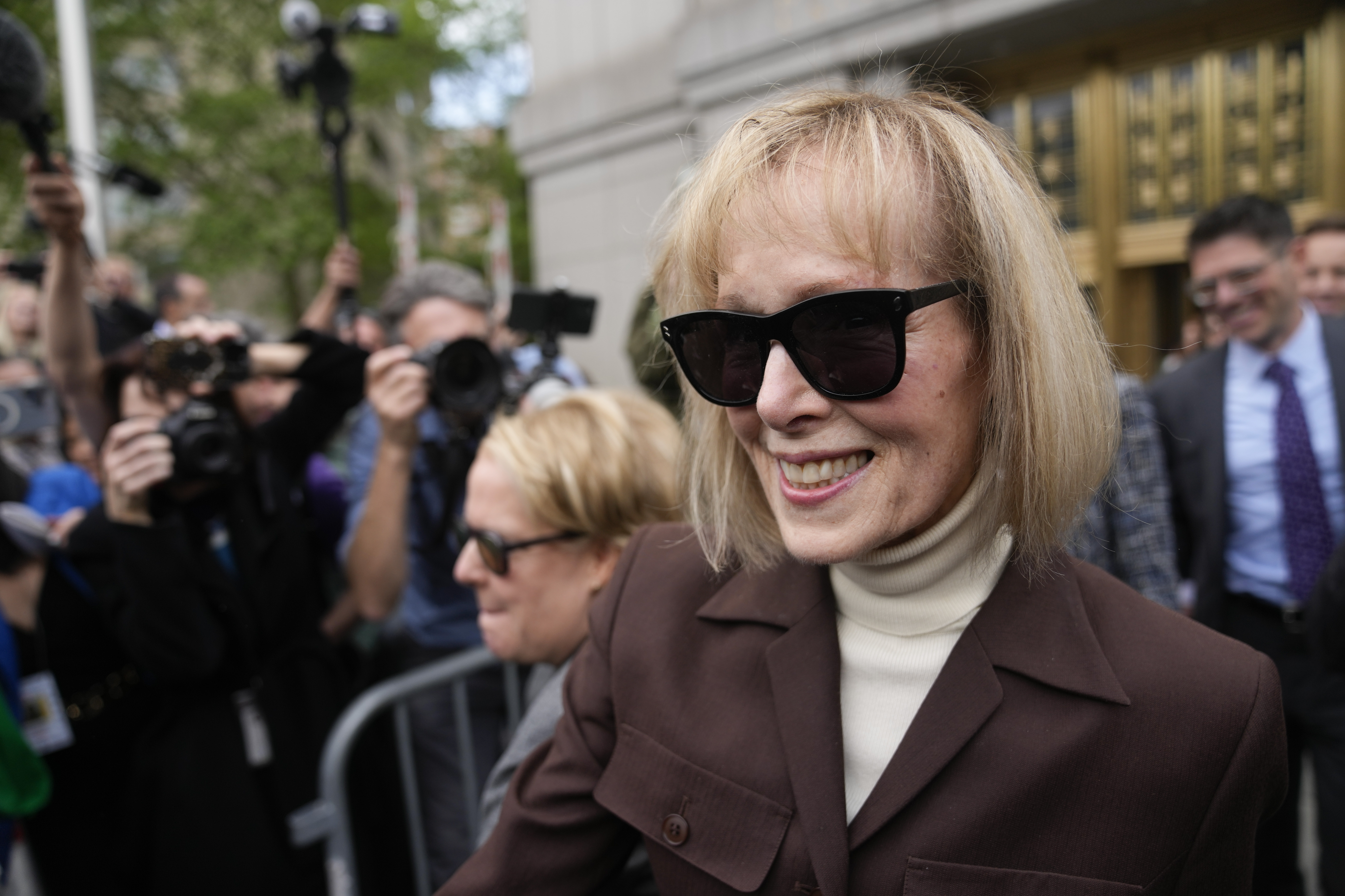 E. Jean Carroll walks out of federal court May 9, 2023, in New York. (AP Photo/Seth Wenig, File)