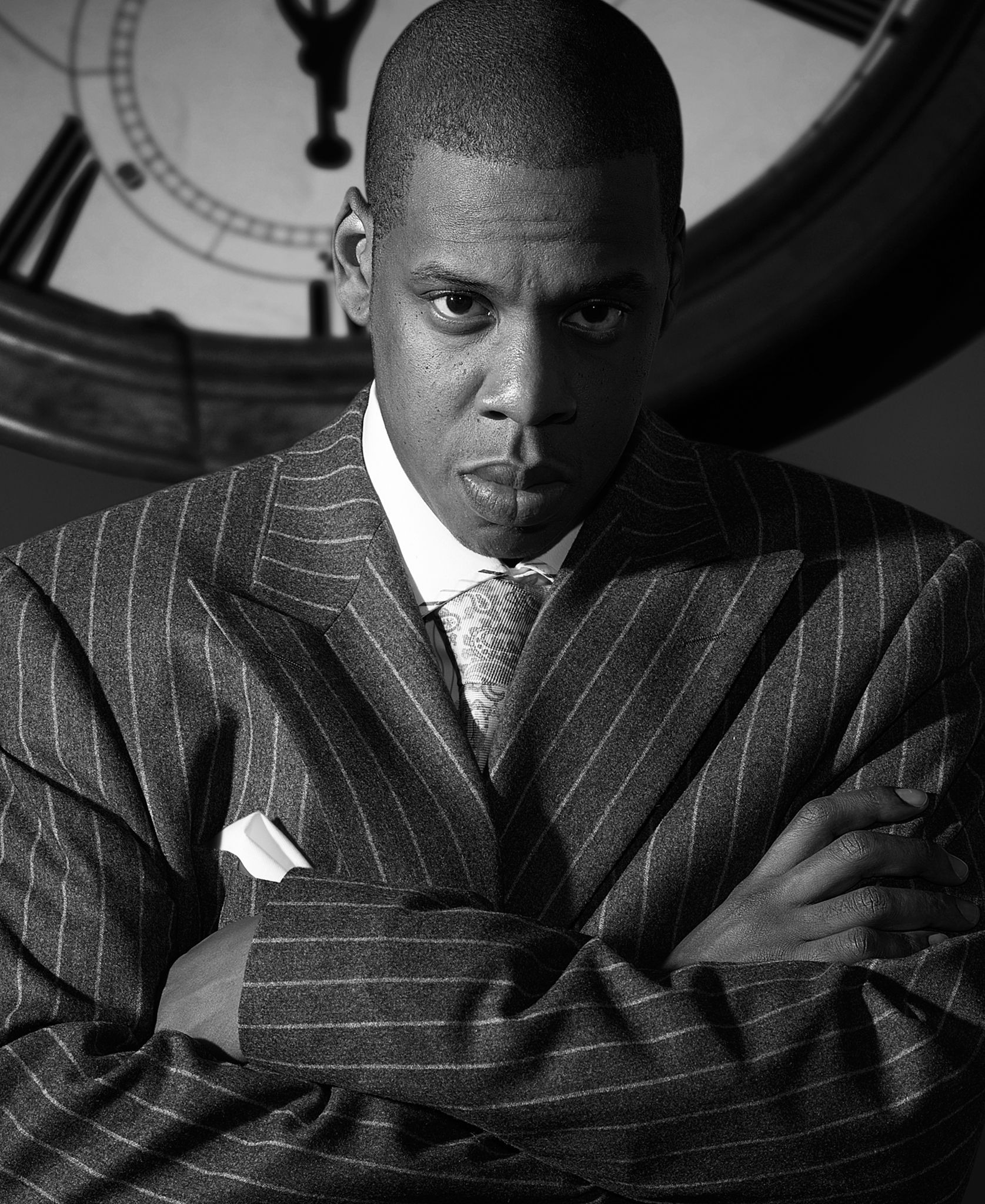 Jay Z in pintstripe suit shot in black and white