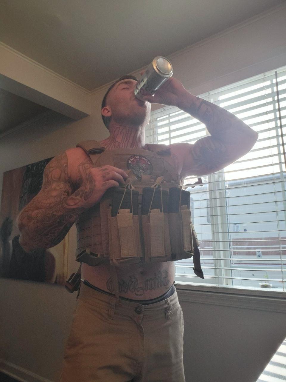 Daniel Rowe pictured wearing body armor. (Telegram)