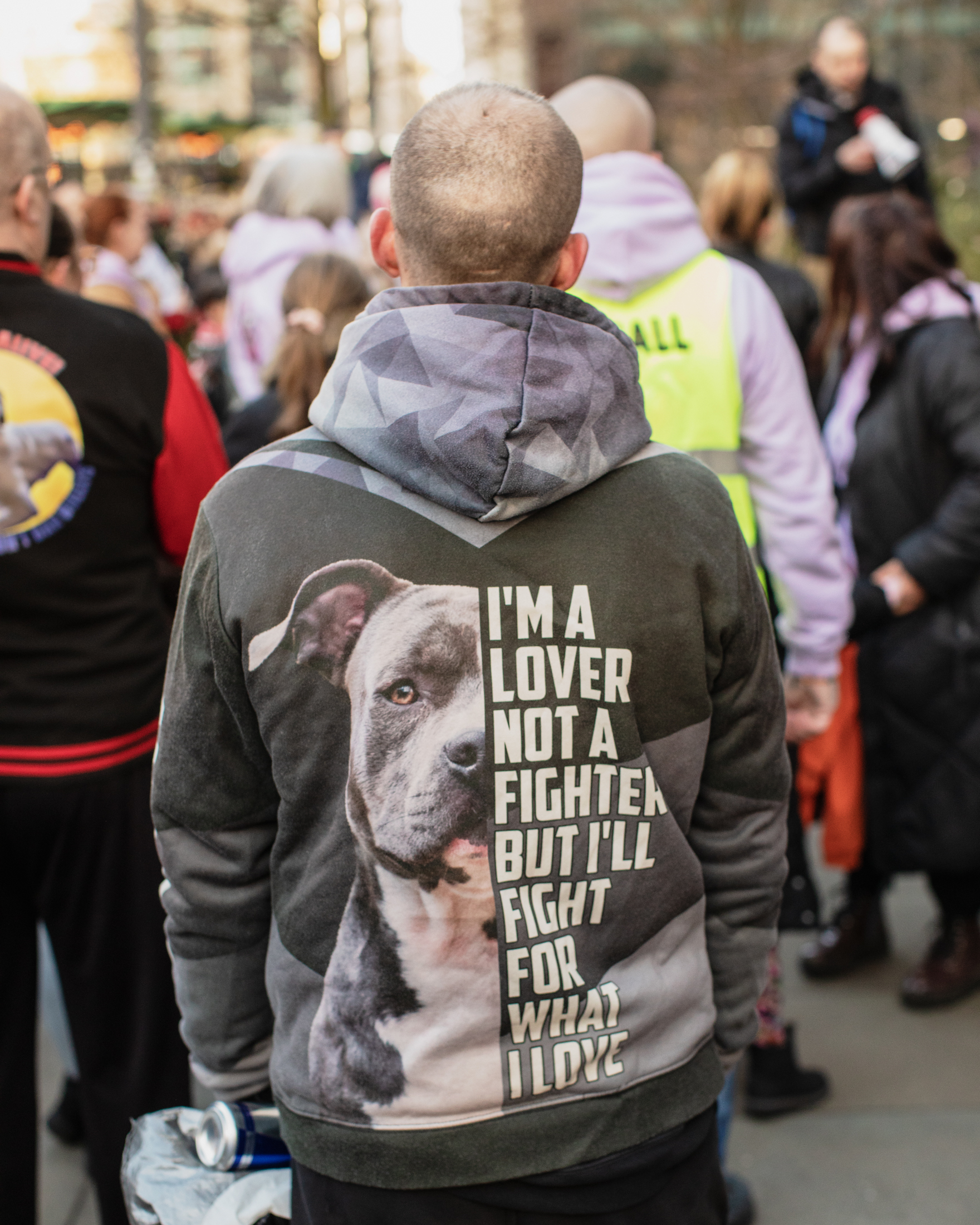 Manchester, UK: A man wearing an XL Bully hoodie that says 