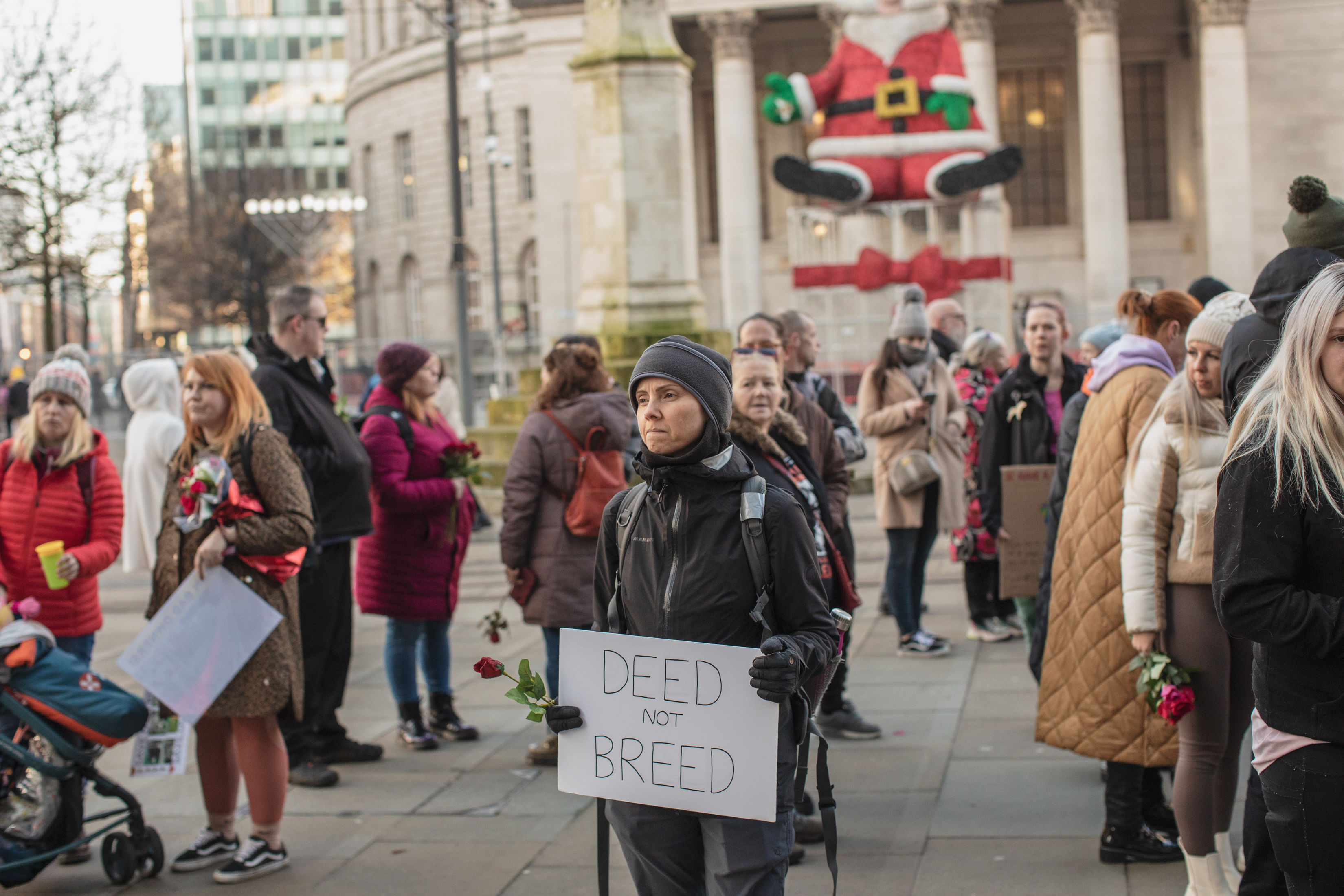 Manchester, UK: A person holds up a sign reading 