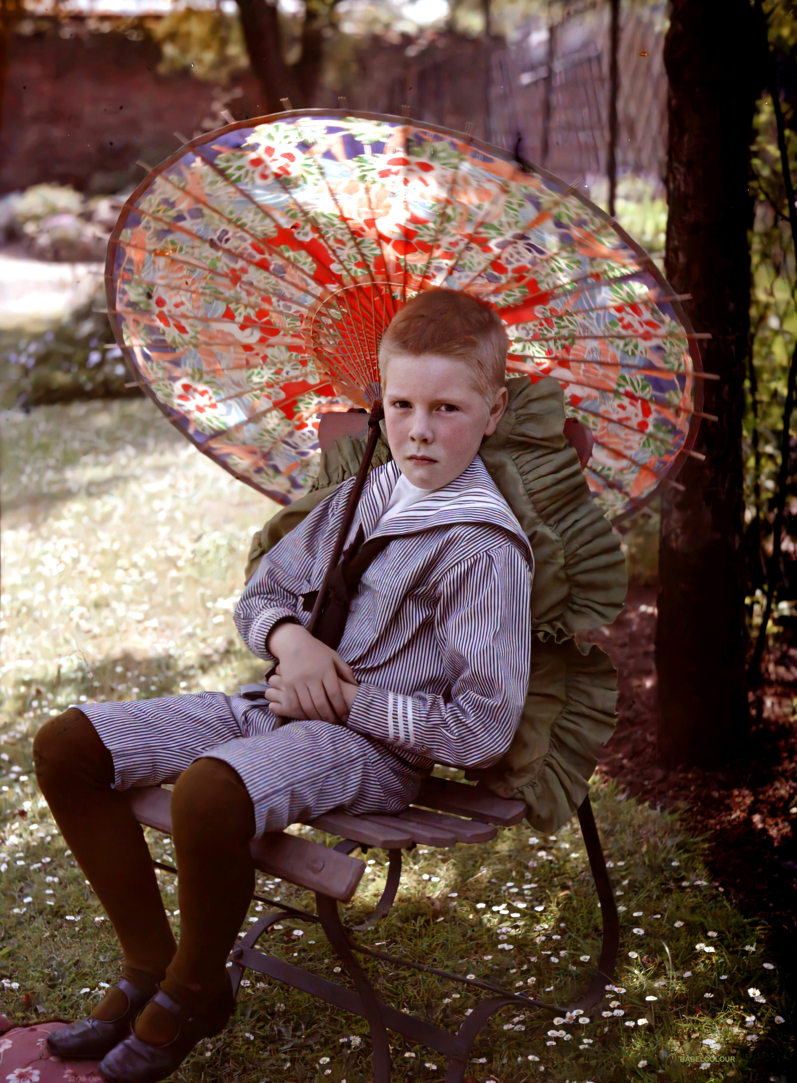 1910 - Boy with parasol (unknown photographer).jpg