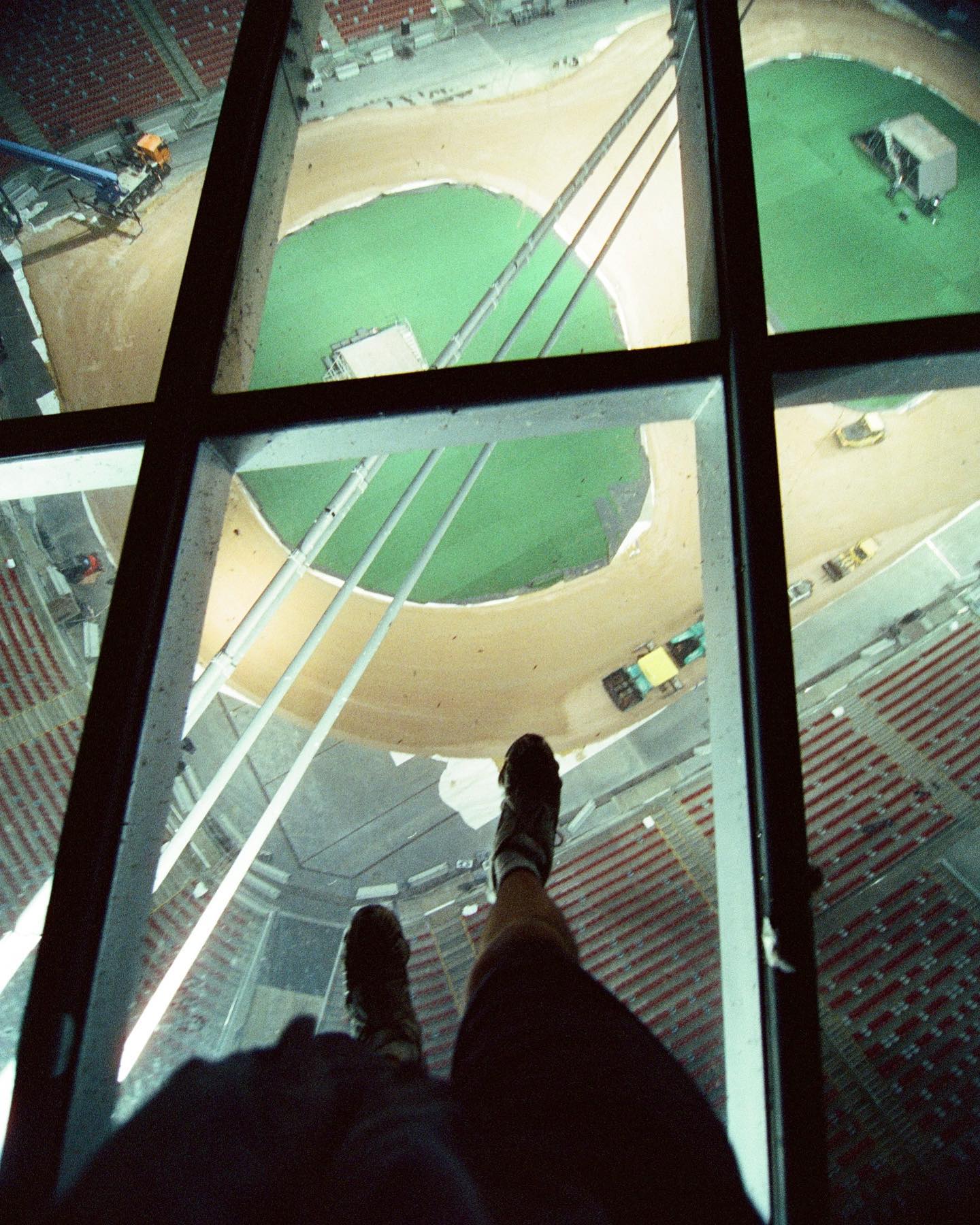 Man on top of stadium in Europe.