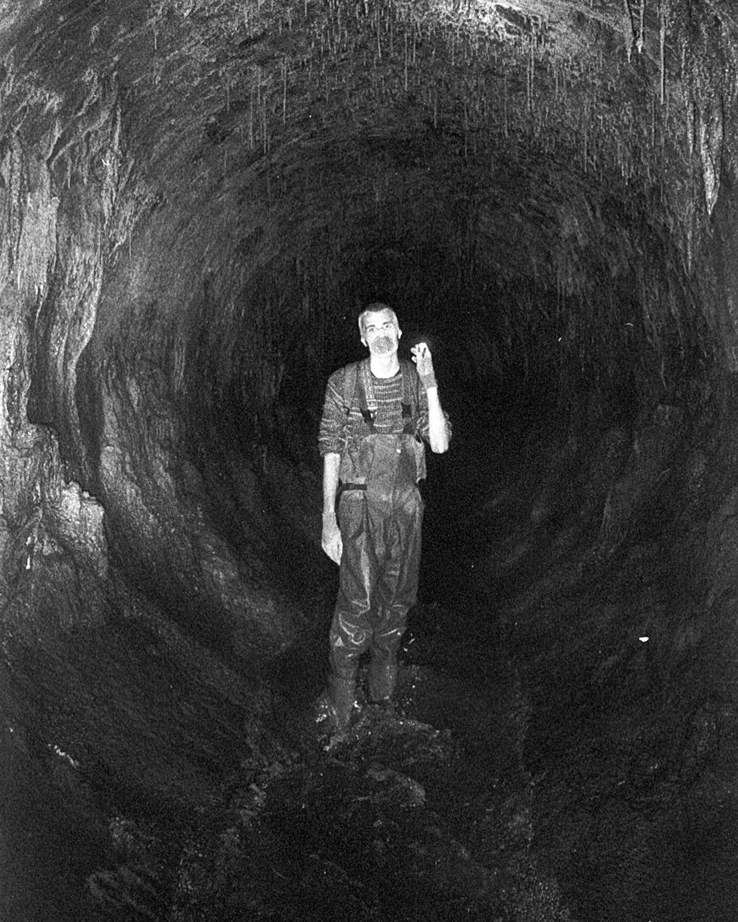 Man in sewer tunnel in Europe.