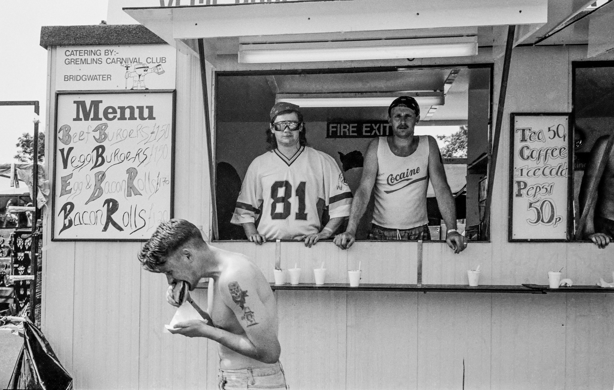 Two men working in a food van.